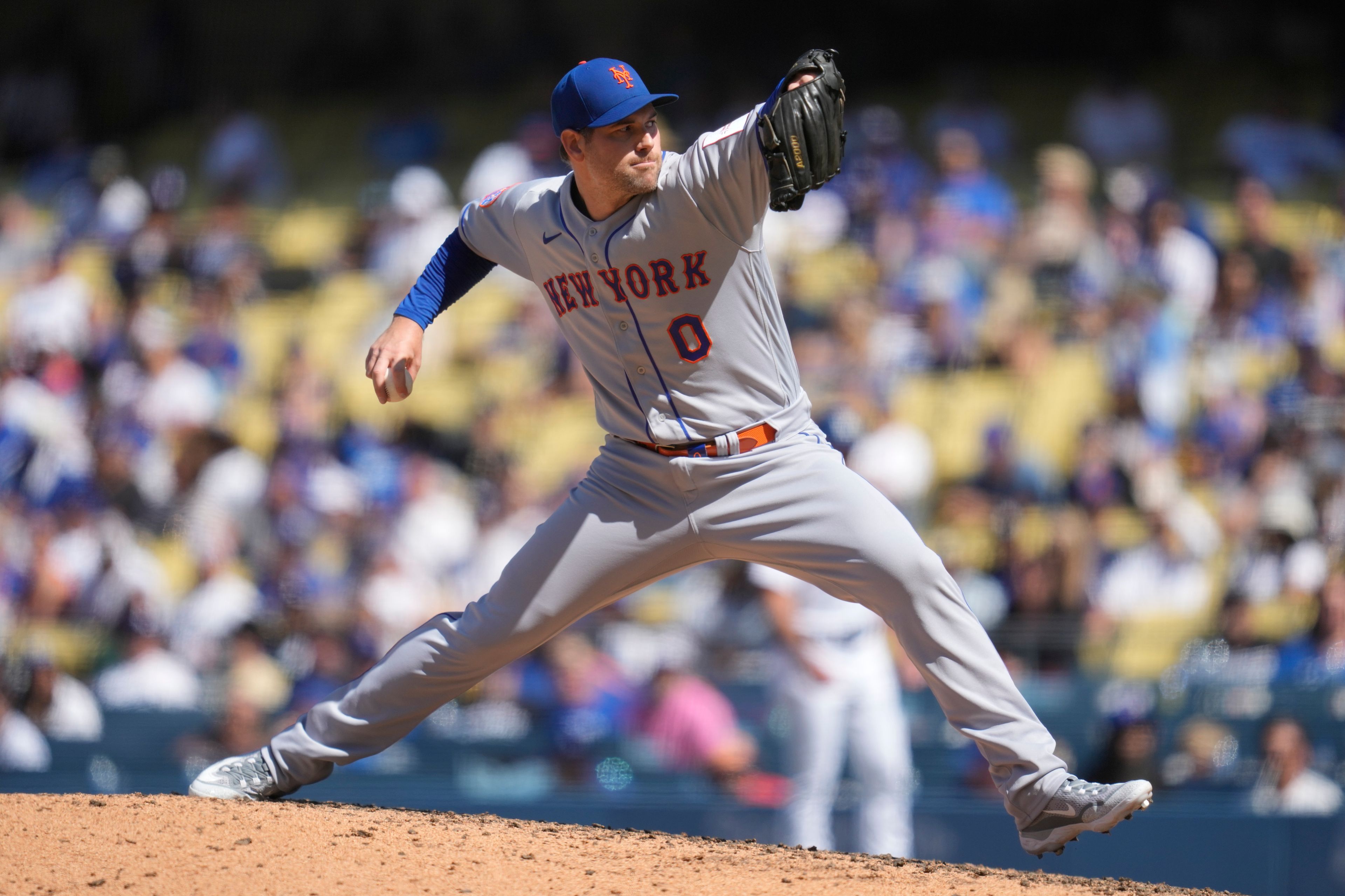 New York Mets relief pitcher Adam Ottavino (0) throws during the ninth inning of a baseball game against the Los Angeles Dodgers in Los Angeles, Wednesday, April 19, 2023. (AP Photo/Ashley Landis)