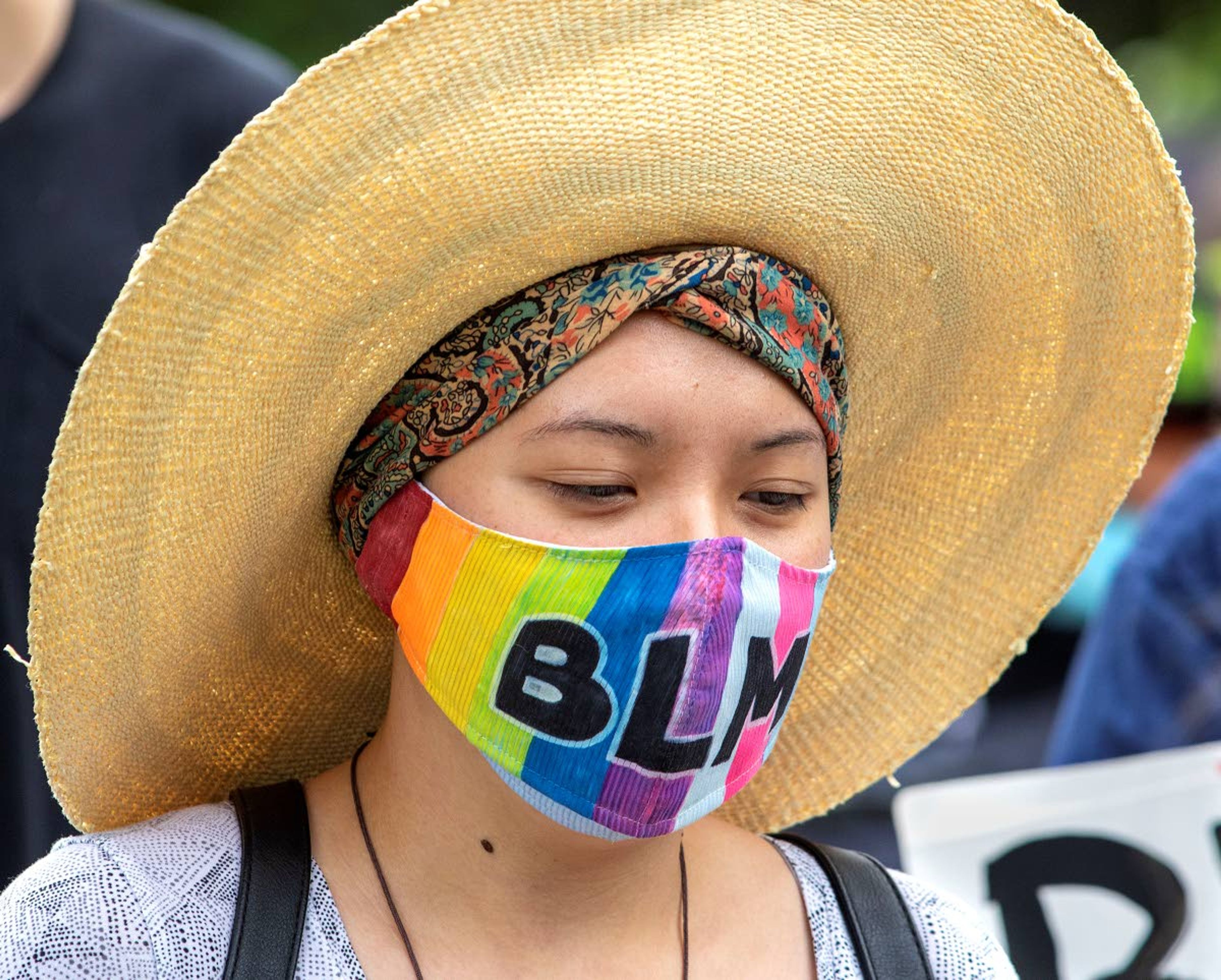 A protester wears a Black Lives Matter face mask while marching on Sunday in Moscow.Geoff Crimmins Daily News