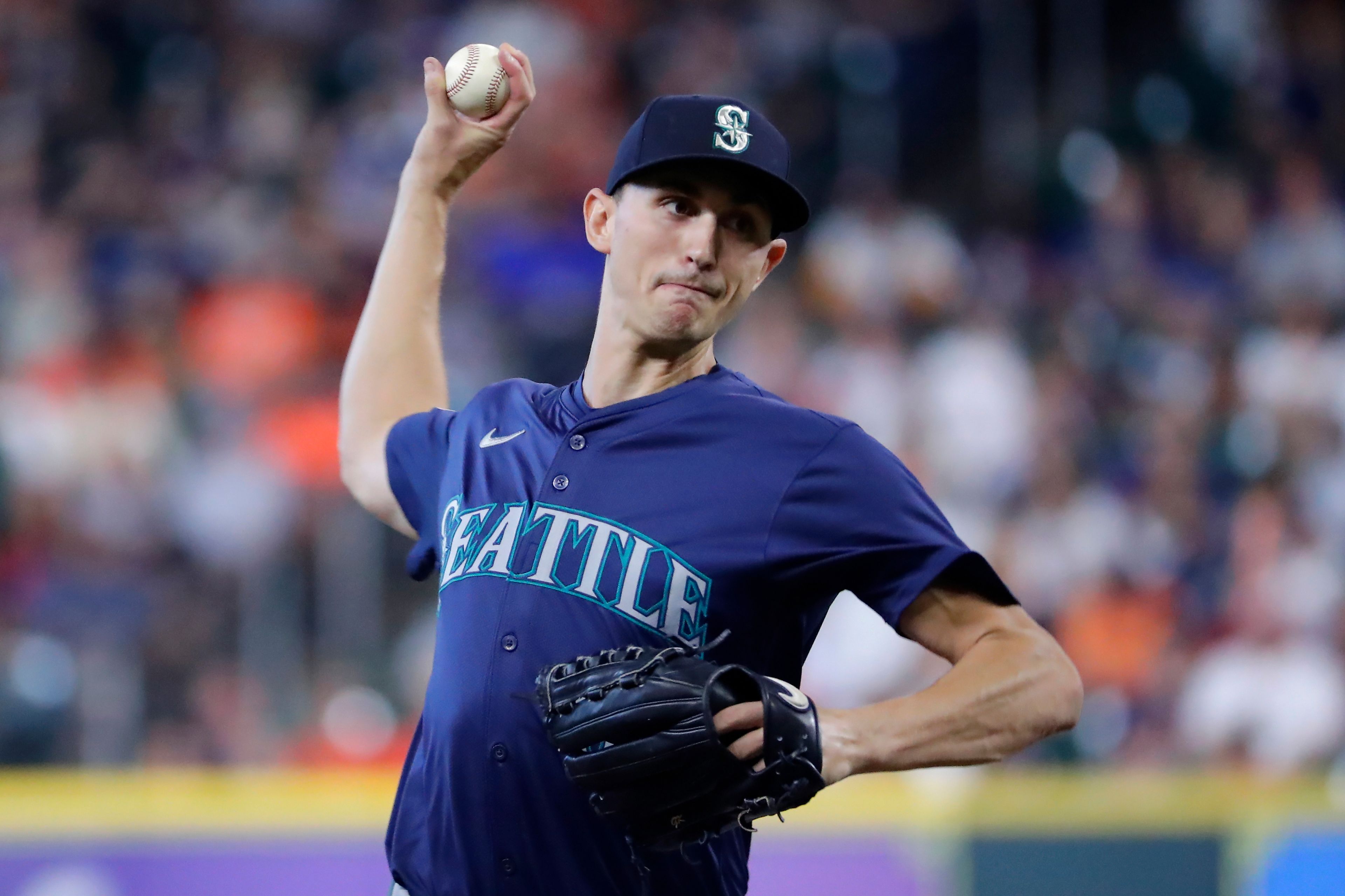 Seattle Mariners starting pitcher George Kirby throws against the Houston Astros during the first inning of a baseball game Wednesday, Sept. 25, 2024, in Houston. (AP Photo/Michael Wyke)