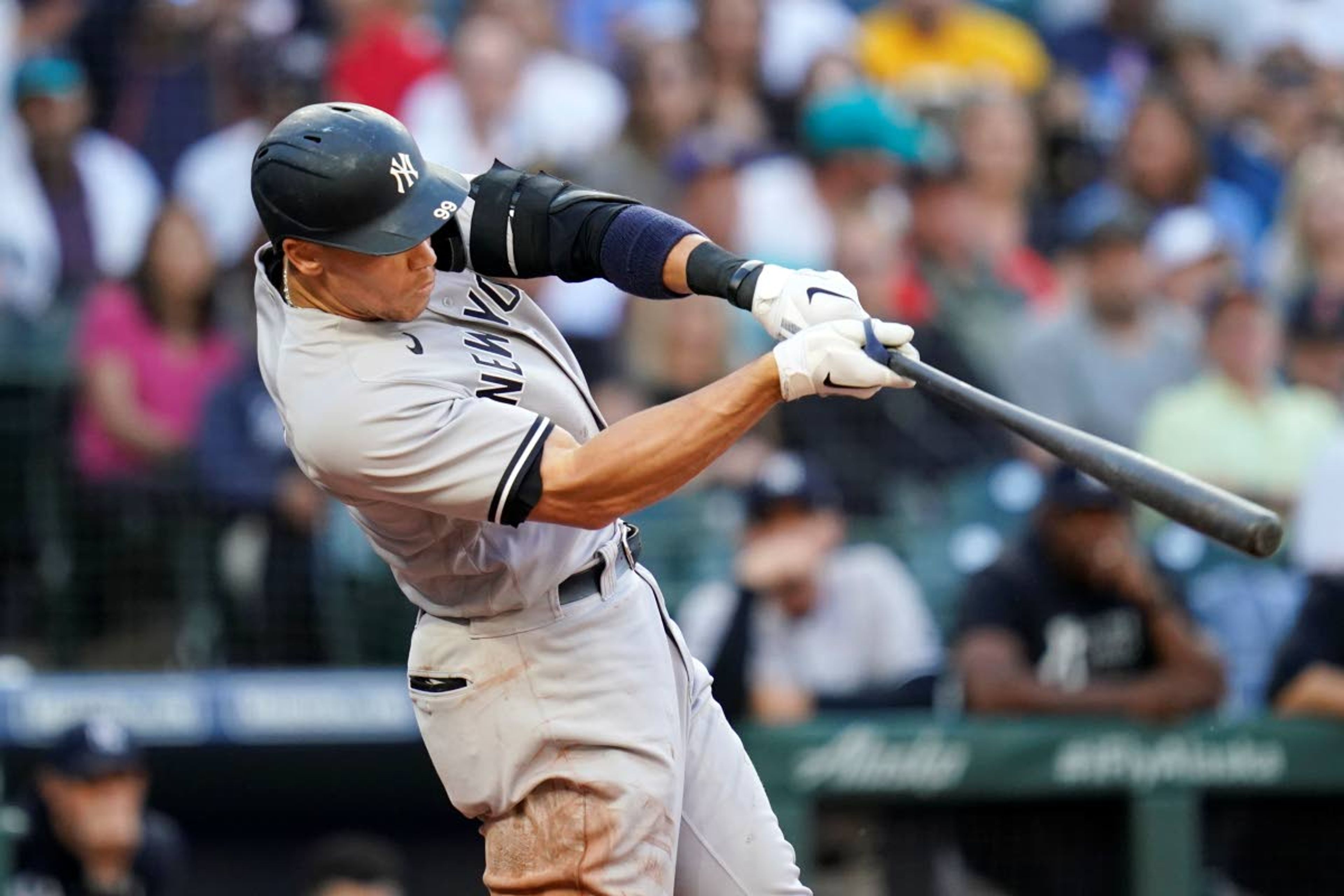 New York Yankees' Aaron Judge hits a two-run home run against the Seattle Mariners during the second inning of a baseball game Wednesday, July 7, 2021, in Seattle. (AP Photo/Elaine Thompson)