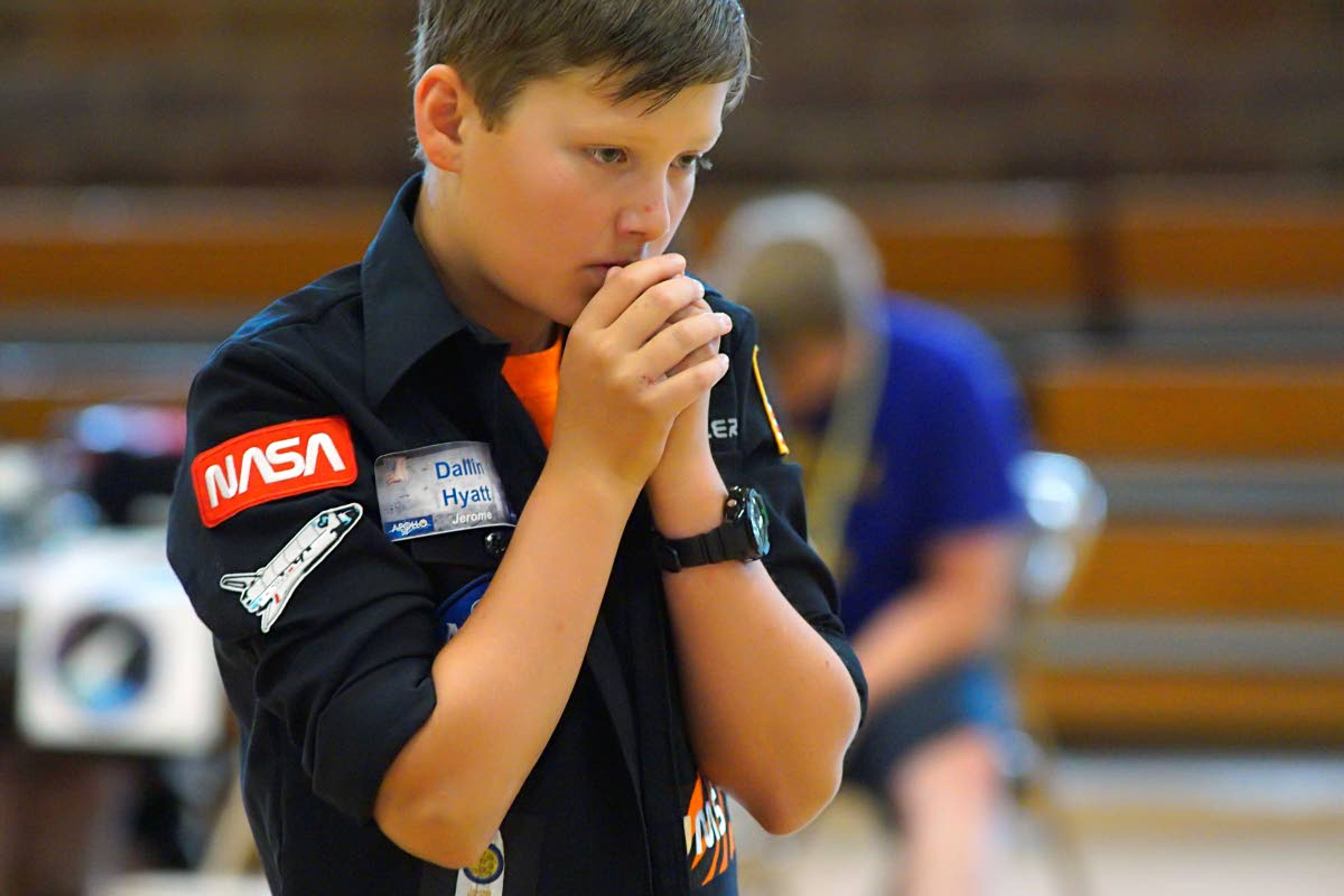 Dallin Hyatt watches as the Jerome team’s robot performs its programmed tasks on a map of the moon during the NASA ANGLeS Challenge at the University of Idaho on Tuesday afternoon.