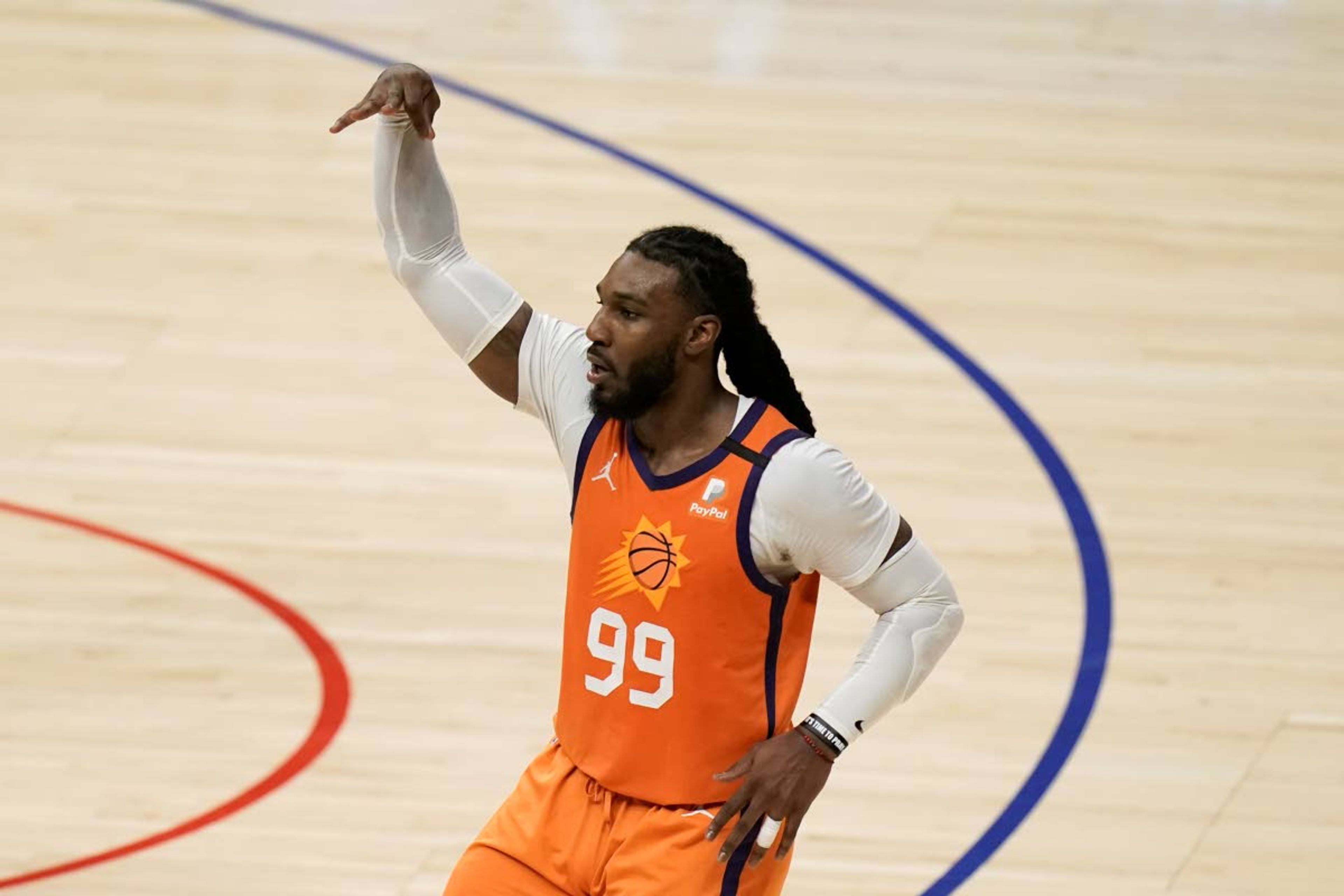 Phoenix Suns' Jae Crowder celebrates his three-point basket during the first half in Game 6 of the NBA basketball Western Conference Finals against the Los Angeles Clippers Wednesday, June 30, 2021, in Los Angeles. (AP Photo/Jae C. Hong)