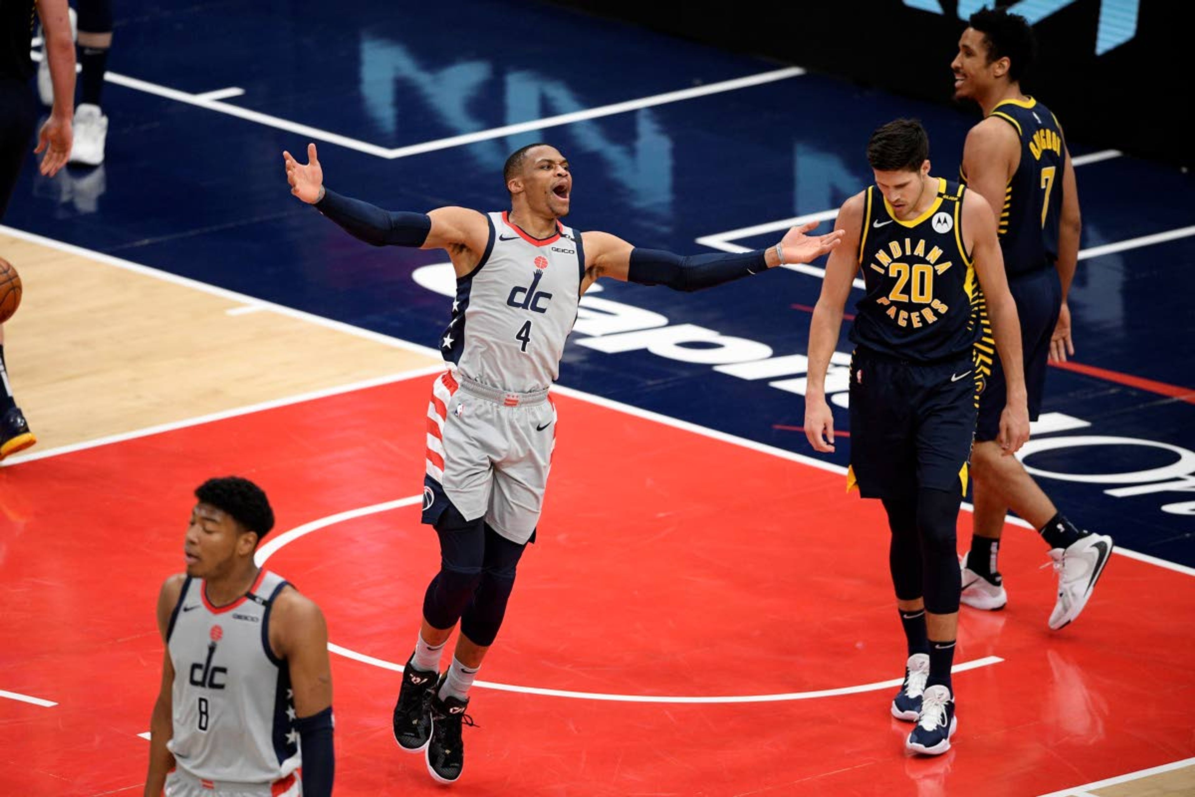 Associated PressWashington Wizards guard Russell Westbrook (4) reacts next to Indiana Pacers forward Doug McDermott (20) and guard Malcolm Brogdon (7) during the second half of an NBA Eastern Conference play-in game Thursday in Washington.