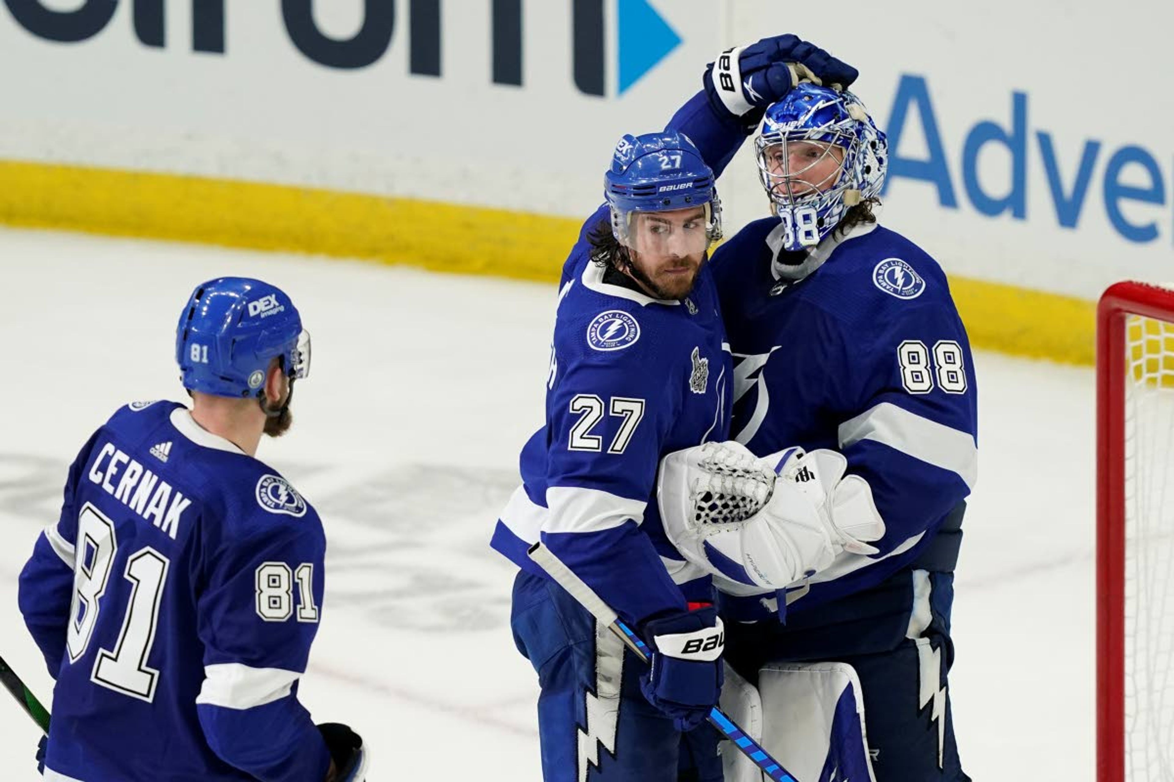 Associated PressLightning defenseman Ryan McDonagh pats goaltender Andrei Vasilevskiy’s helmet after the defending NHL champions took Game 1 of the Stanley Cup finals against the Montreal Canadiens on Monday in Tampa, Fla.