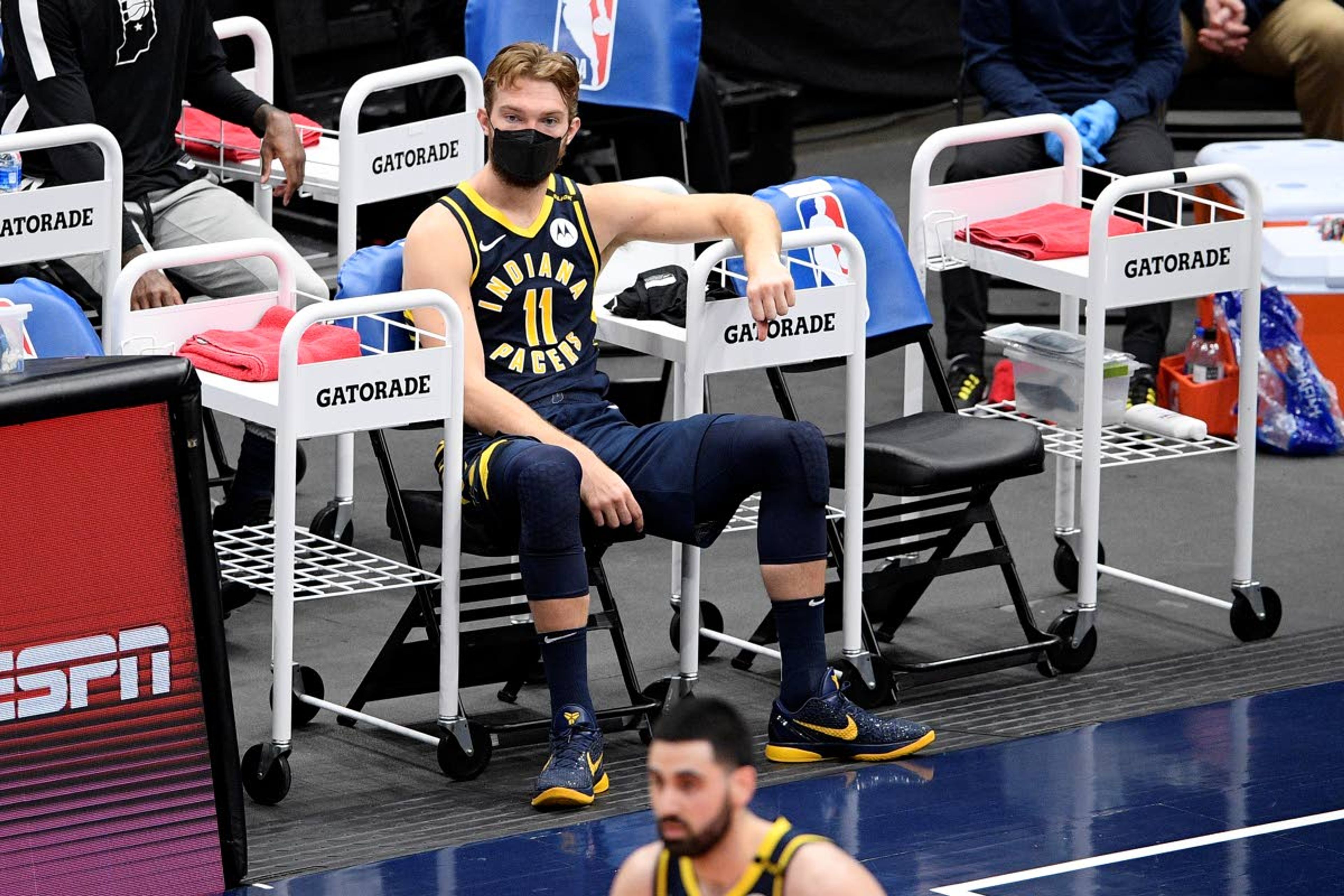 Indiana Pacers forward Domantas Sabonis (11) watches from the bench area during the second half of an NBA basketball Eastern Conference play-in game against the Washington Wizards, Thursday, May 20, 2021, in Washington. The Wizards won 142-115. (AP Photo/Nick Wass)