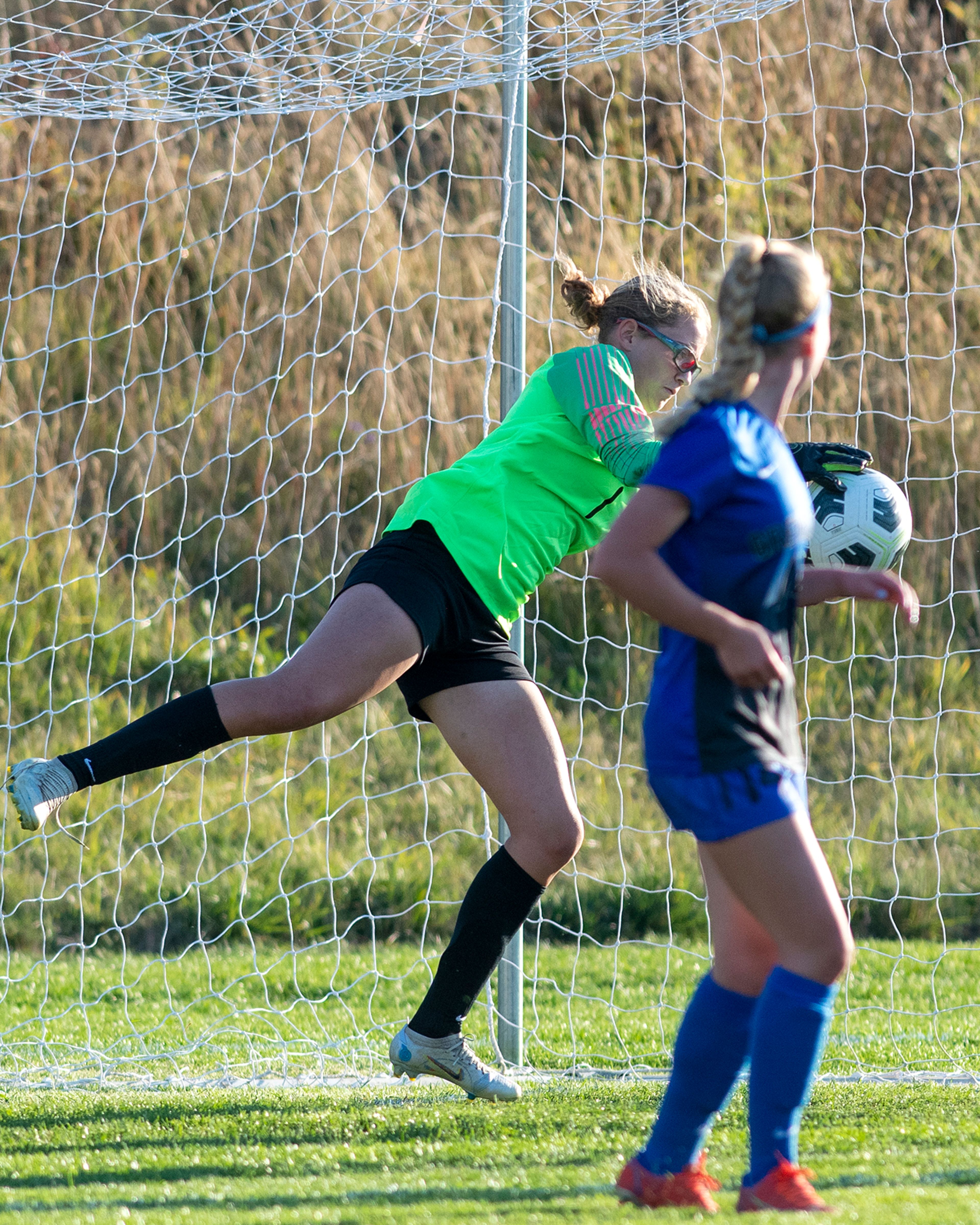 Pullman’s Lillian Cobos (1) saves a shot on goal during a Class 2A Greater Spokane League game against West Valley at Pullman High School on Tuesday.