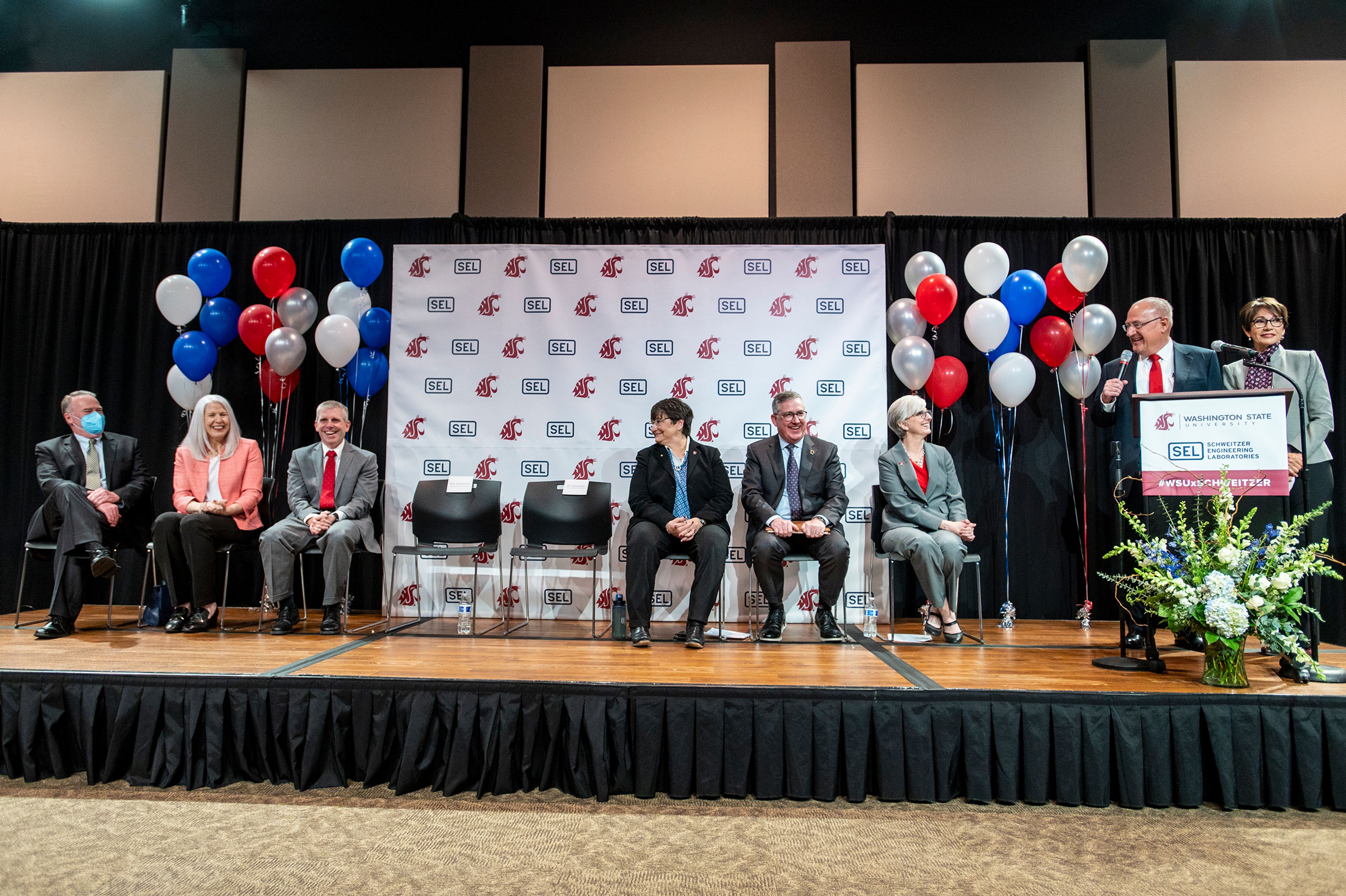 Schweitzer Engineering Laboratories President Ed Schweitzer and Director of Community Outreach Beatriz Schweitzer speak to the audience about the long-standing relationship of SEL and Washington State University.