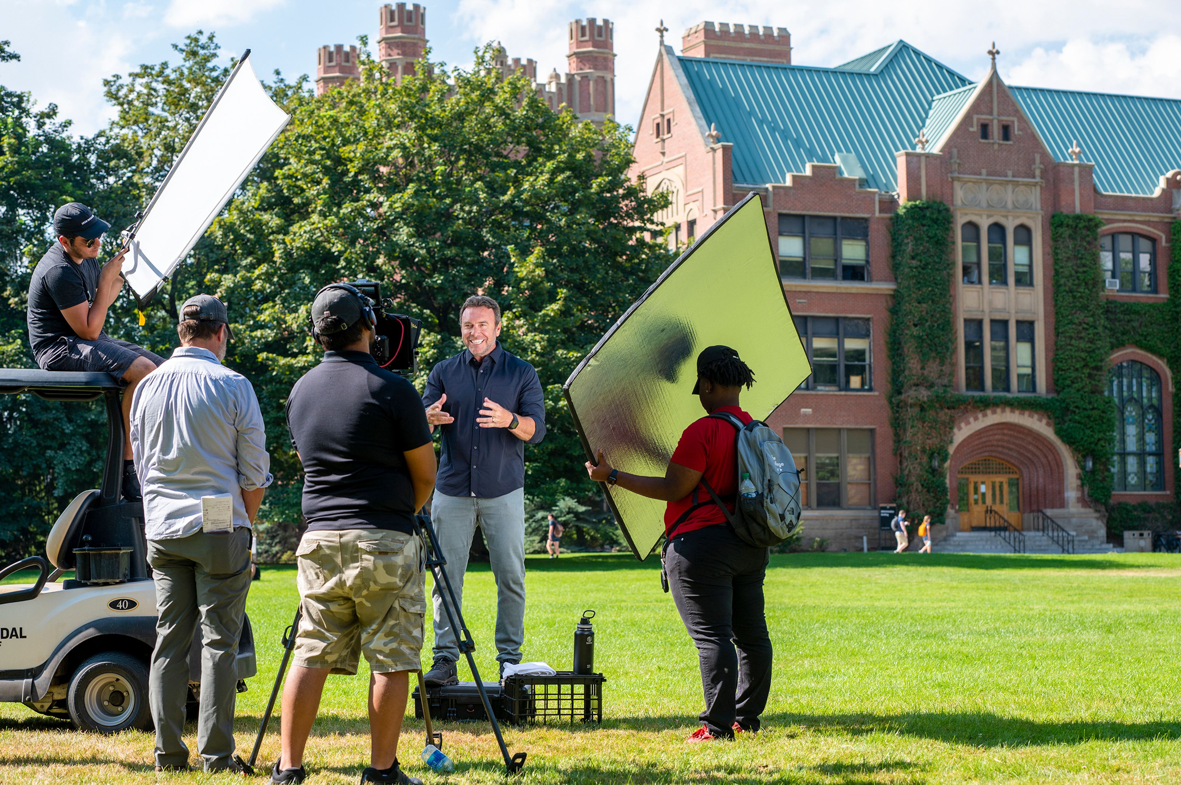 Zach Wilkinson/Daily News Alex Boylan, host and co-creator of “The College Tour,” films a segment of the show Friday in front of the Administration Building on University of Idaho’s campus in Moscow. The University of Idaho will be the first Idaho university featured on the show.