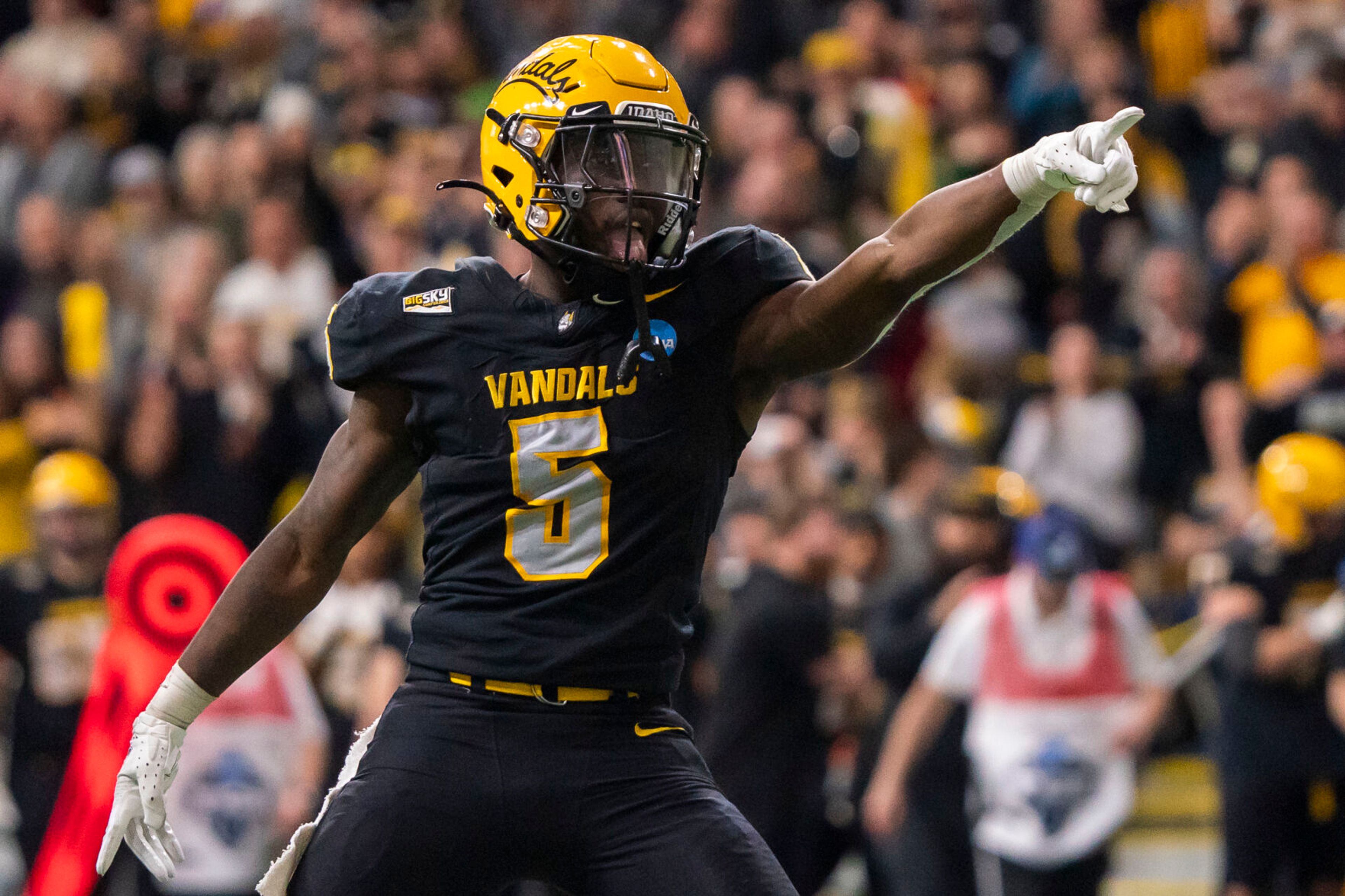 Idaho Vandals running back Anthony Woods (5) celebrates a first down during their game against Albany in the third round of the 2023 Division I FCS Football Championship on Saturday inside the Kibbie Dome in Moscow.