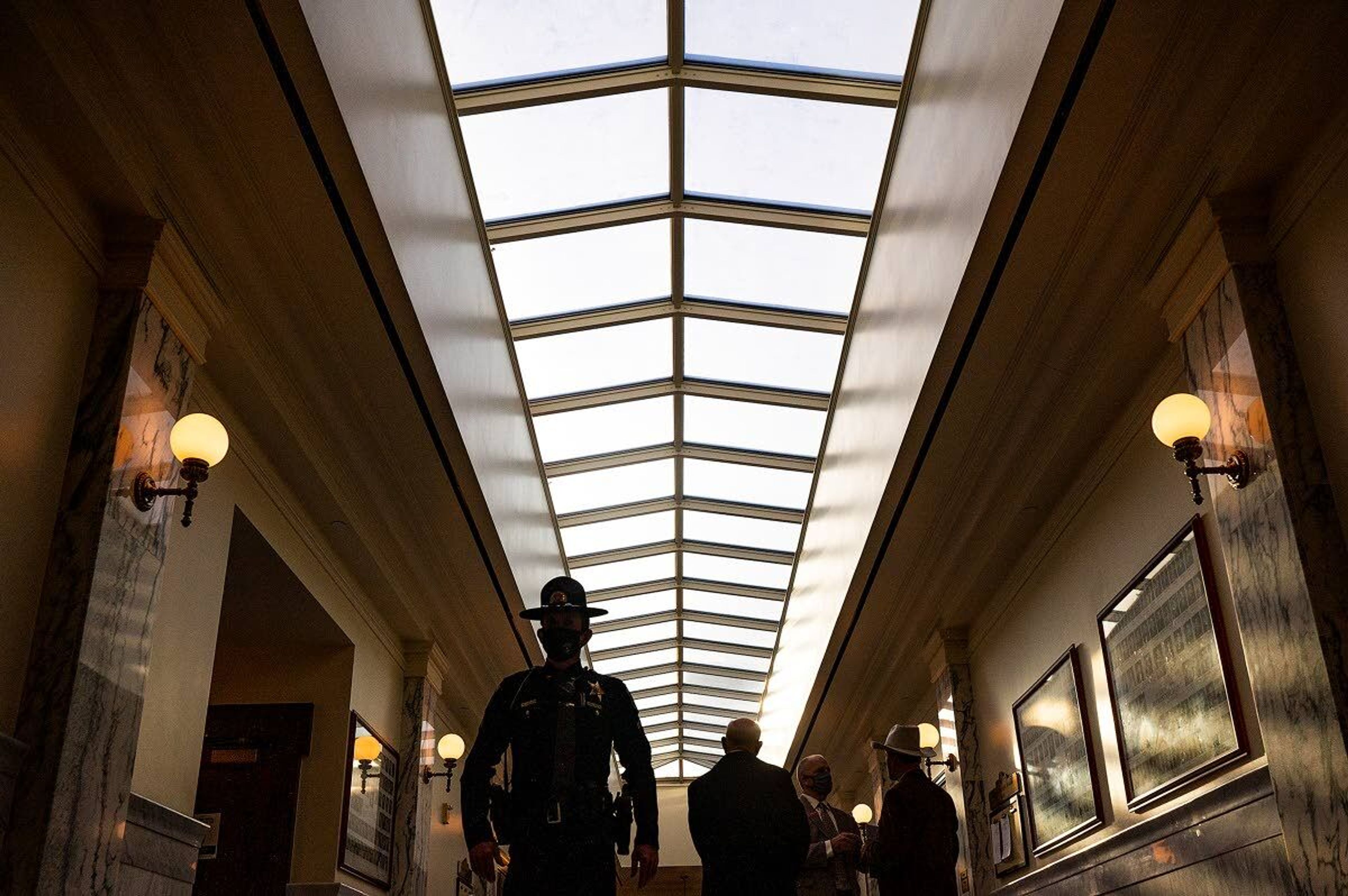 Morning sunlight shines into the east wing on the Garden Level floor of the Idaho Capitol earlier this month, in Boise. This corridor houses many of the committees and meeting rooms at the Capitol.