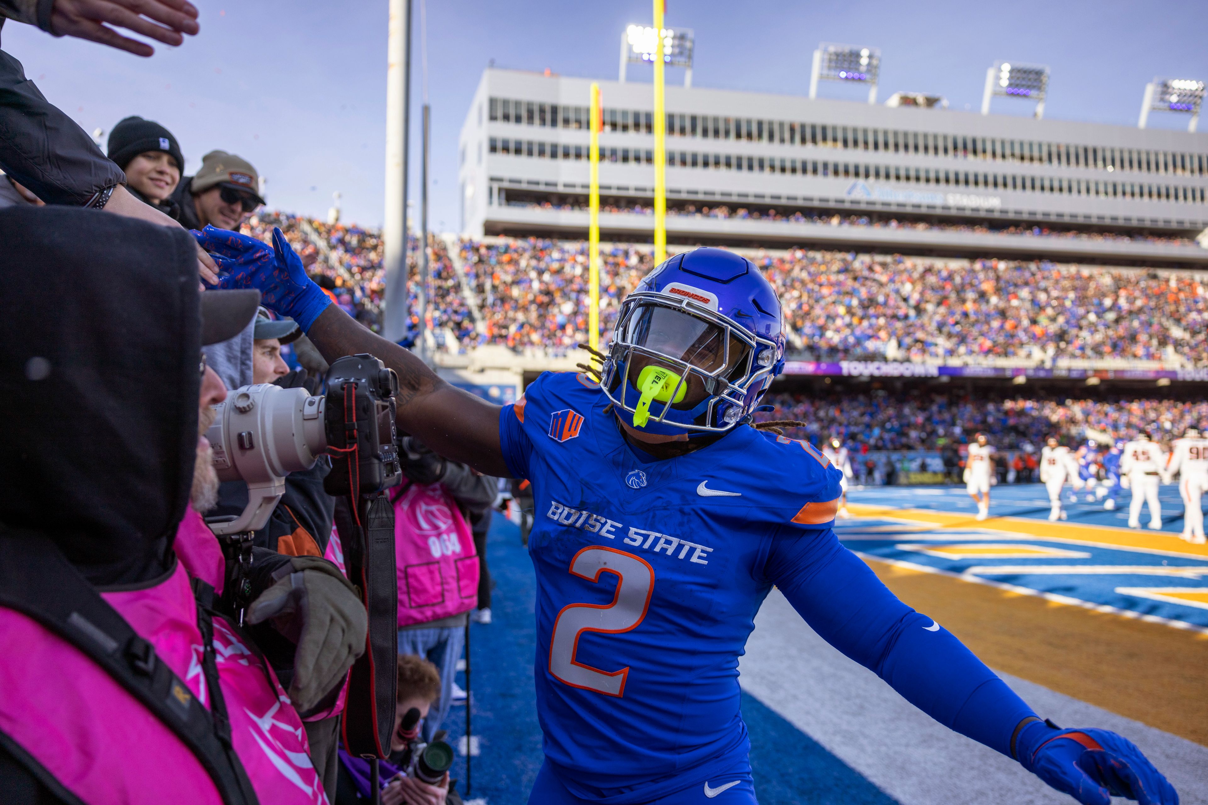 Boise State running back Ashton Jeanty (2) celebrates a score with the fans Boise State against Oregon State in an NCAA college football game, Friday, Nov. 29, 2024, in Boise, Idaho. (Drew Nash/Times-News via AP)