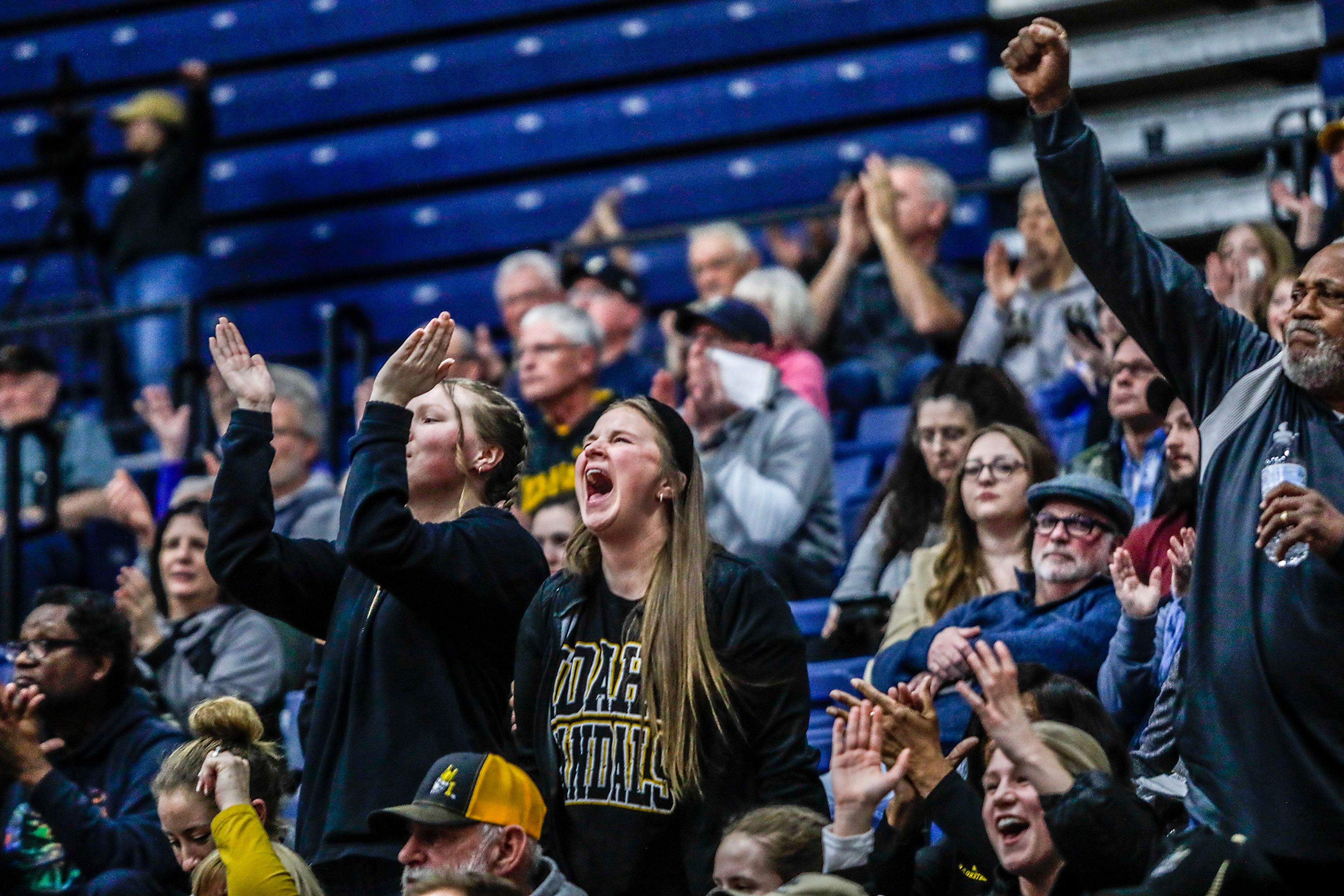 Idaho fans cheer on the team against Northern Colorado in a Big Sky game at the P1FCU Activity Center on the Lewis-Clark State College campus Thursday in Lewiston.