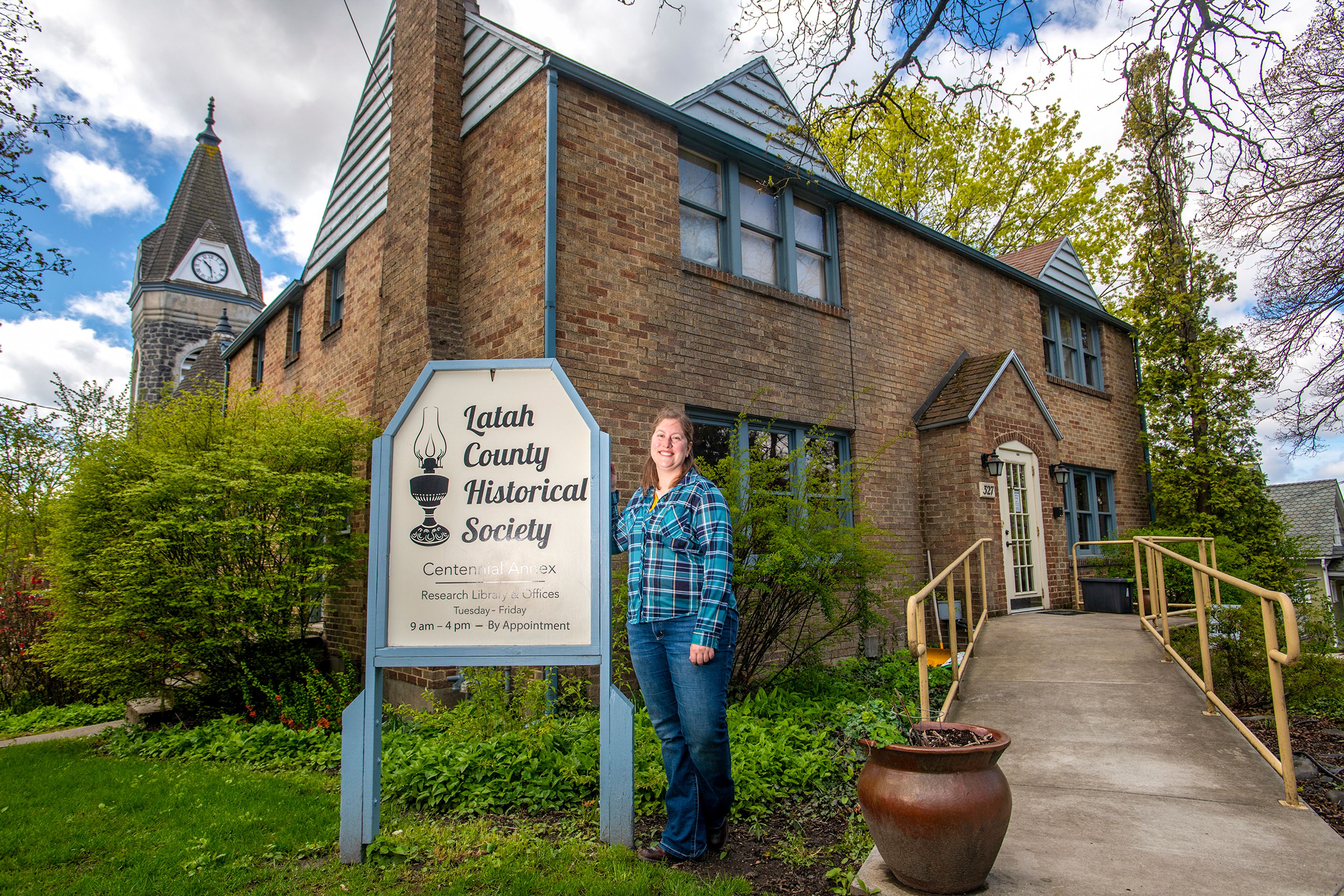 Executive director Hayley Noble poses for a portrait in front of the Latah County Historical Society building Friday morning in Moscow. Since taking over the position on April 1, Noble said, â€œItâ€™s been really great. Iâ€™m so excited for what weâ€™re going to do in the future.â€