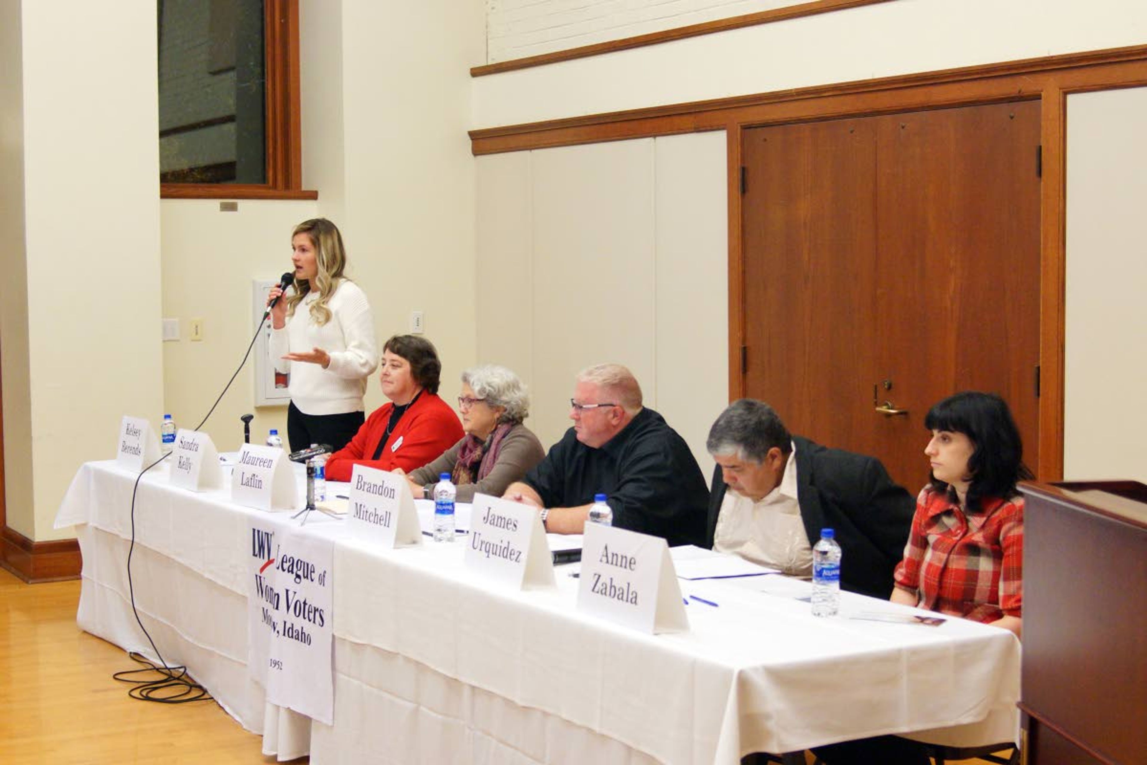 Kai Eiselein/Daily NewsMoscow City Council candidate Kelsey Berends, left, gives her opening statement during a League of Women Voters candidates forum Wednesday evening in the 1912 Center.