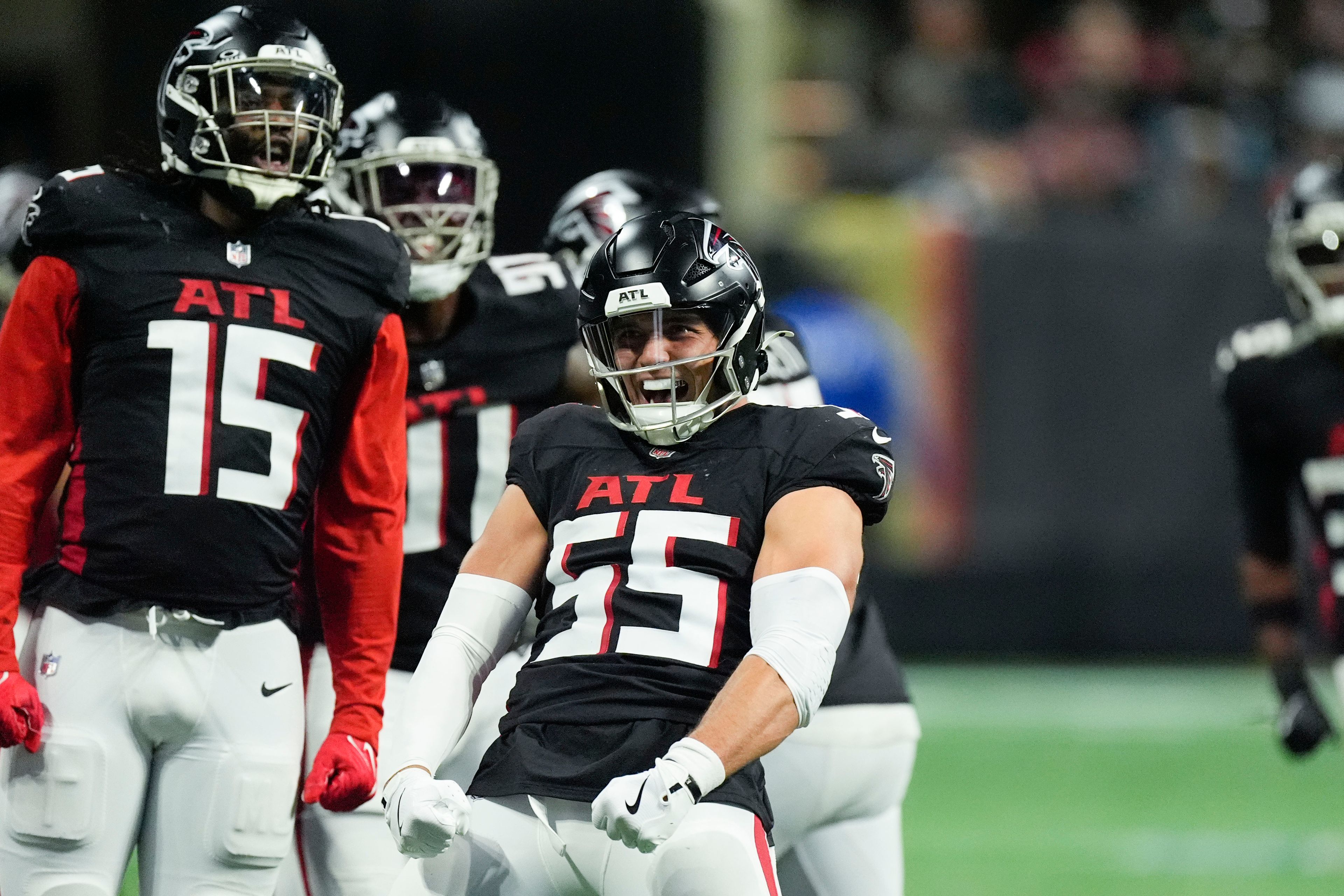 Atlanta Falcons linebacker Kaden Elliss (55) celebrates a tackle for a loss during the first half of an NFL football game against the Dallas Cowboys, Sunday, Nov. 3, 2024, in Atlanta. (AP Photo/ John Bazemore)