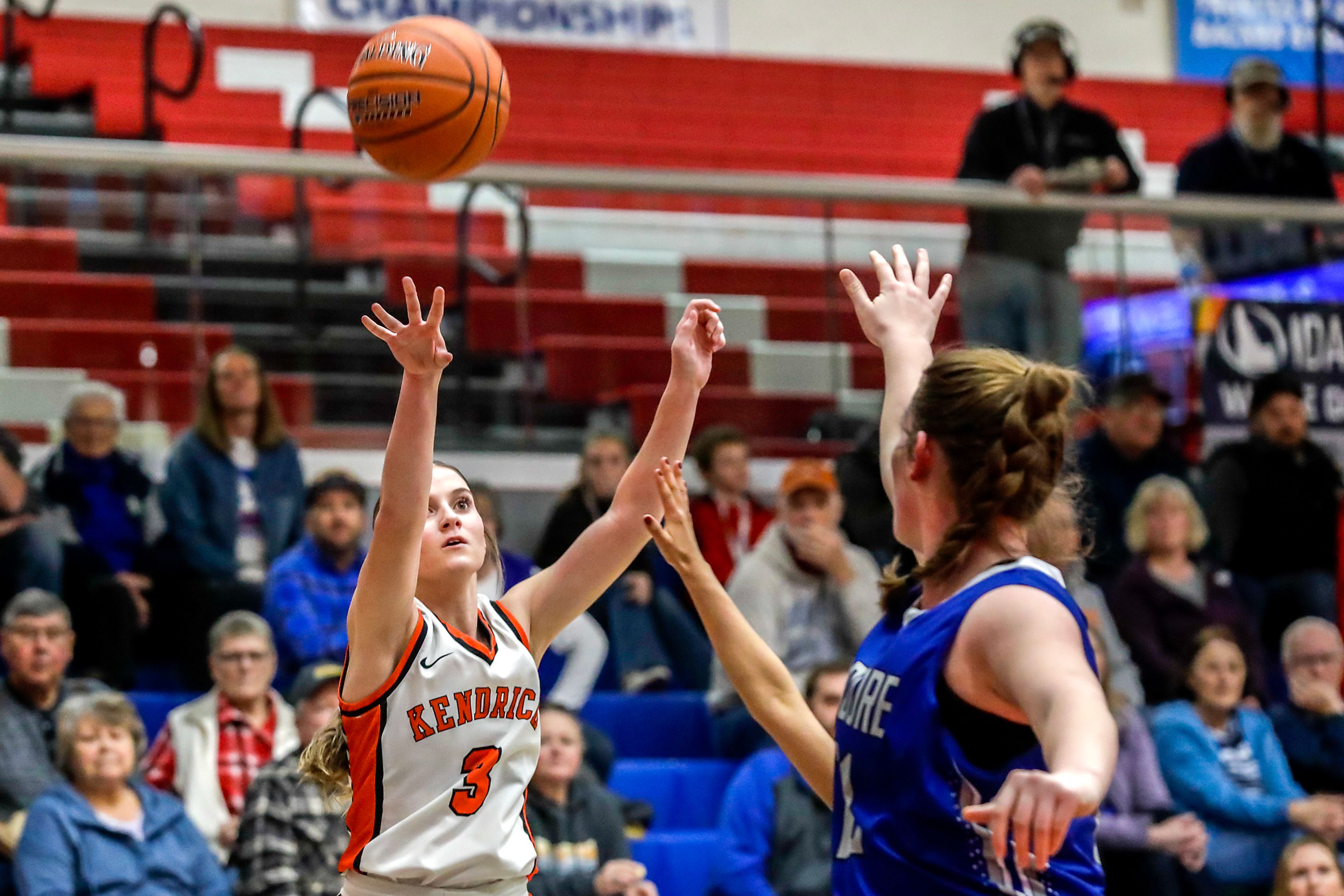 Kendrick guard Harley Heimgartner shoots a three-pointer over Leadore's Lexi Bird during a quarterfinal game in the girls 1A DII state tournament Thursday at Nampa High School in Nampa.