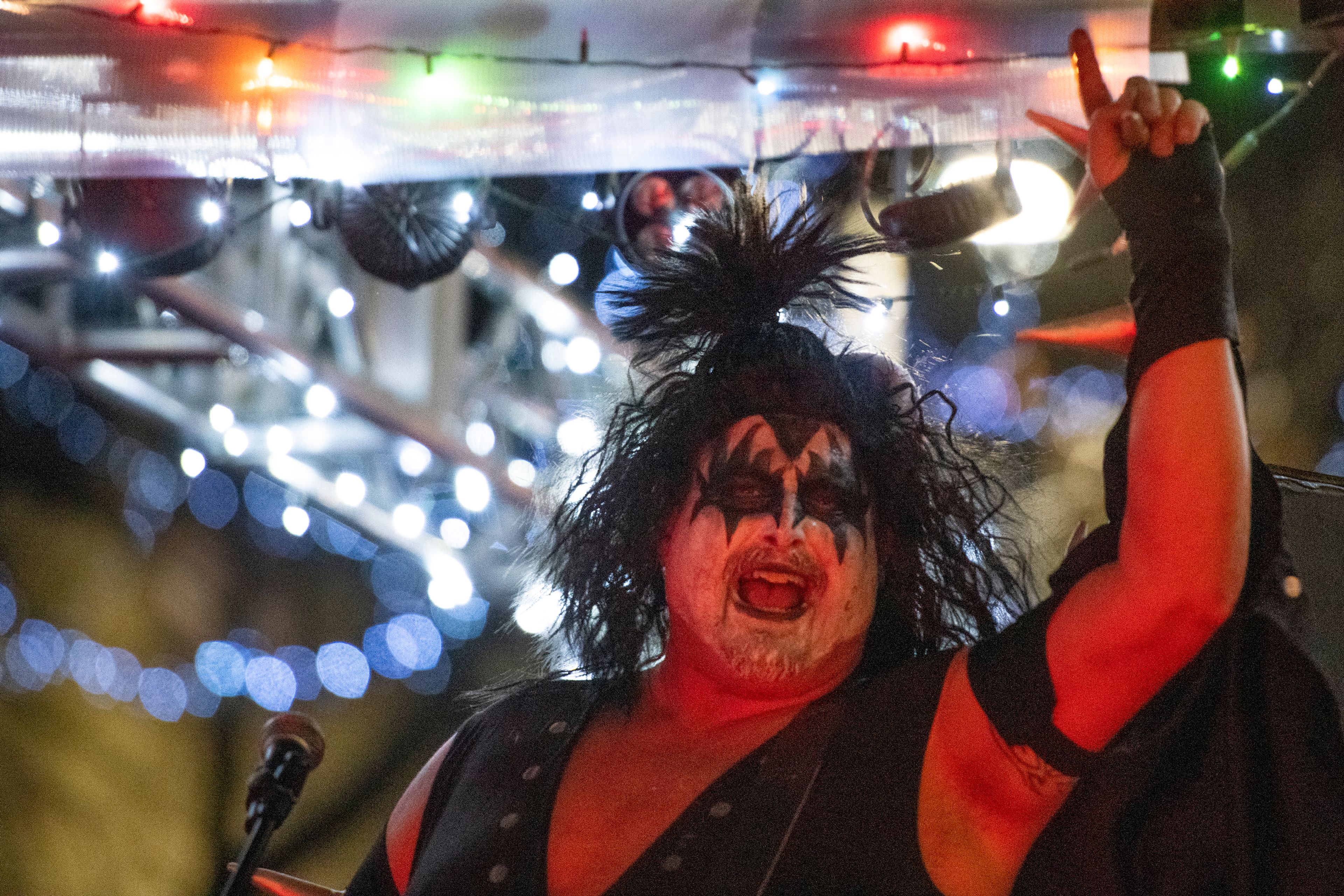 A participant of a Kiss themed float gestures at the crowd during the Light up the Season Parade in downtown Moscow on Thursday.