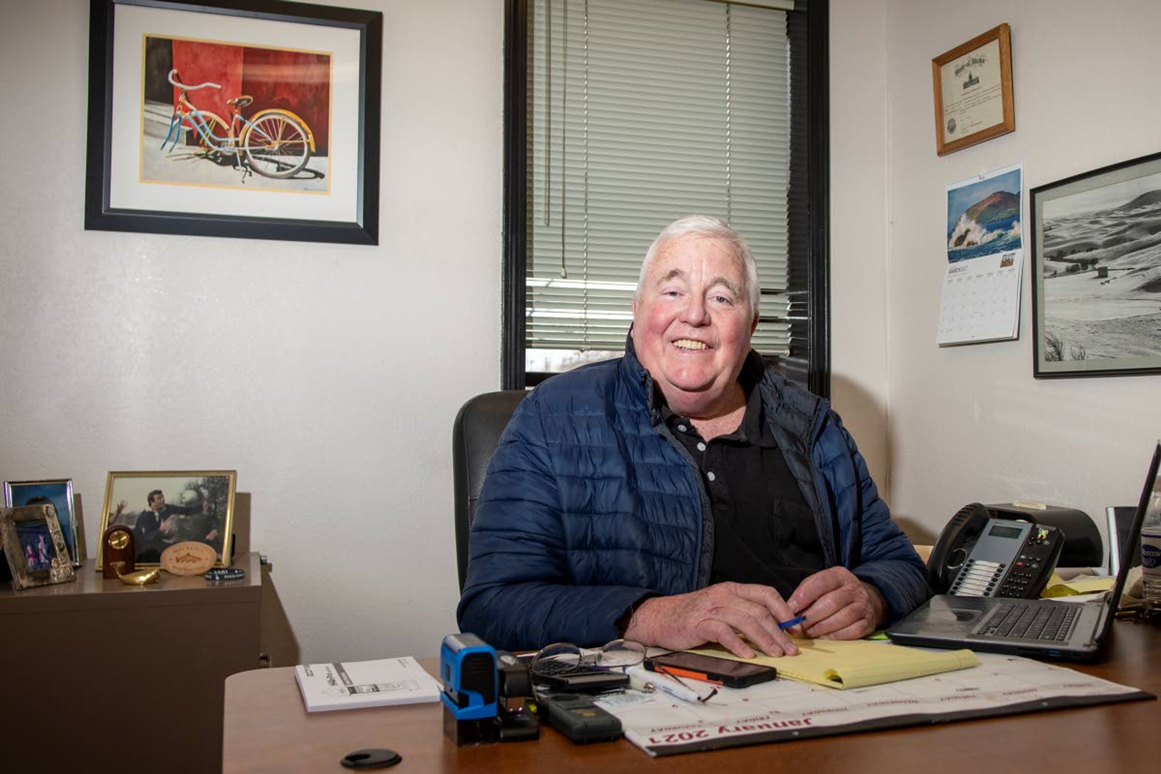 Joe McGurkin has worked at Moscow Realty since 1983, and later became the owner in 2000, until he sold the business earlier this year. McGurkin, who continues to work for Moscow Realty as a broker, poses for a photo Monday morning in his office.Zach Wilkinson Daily News