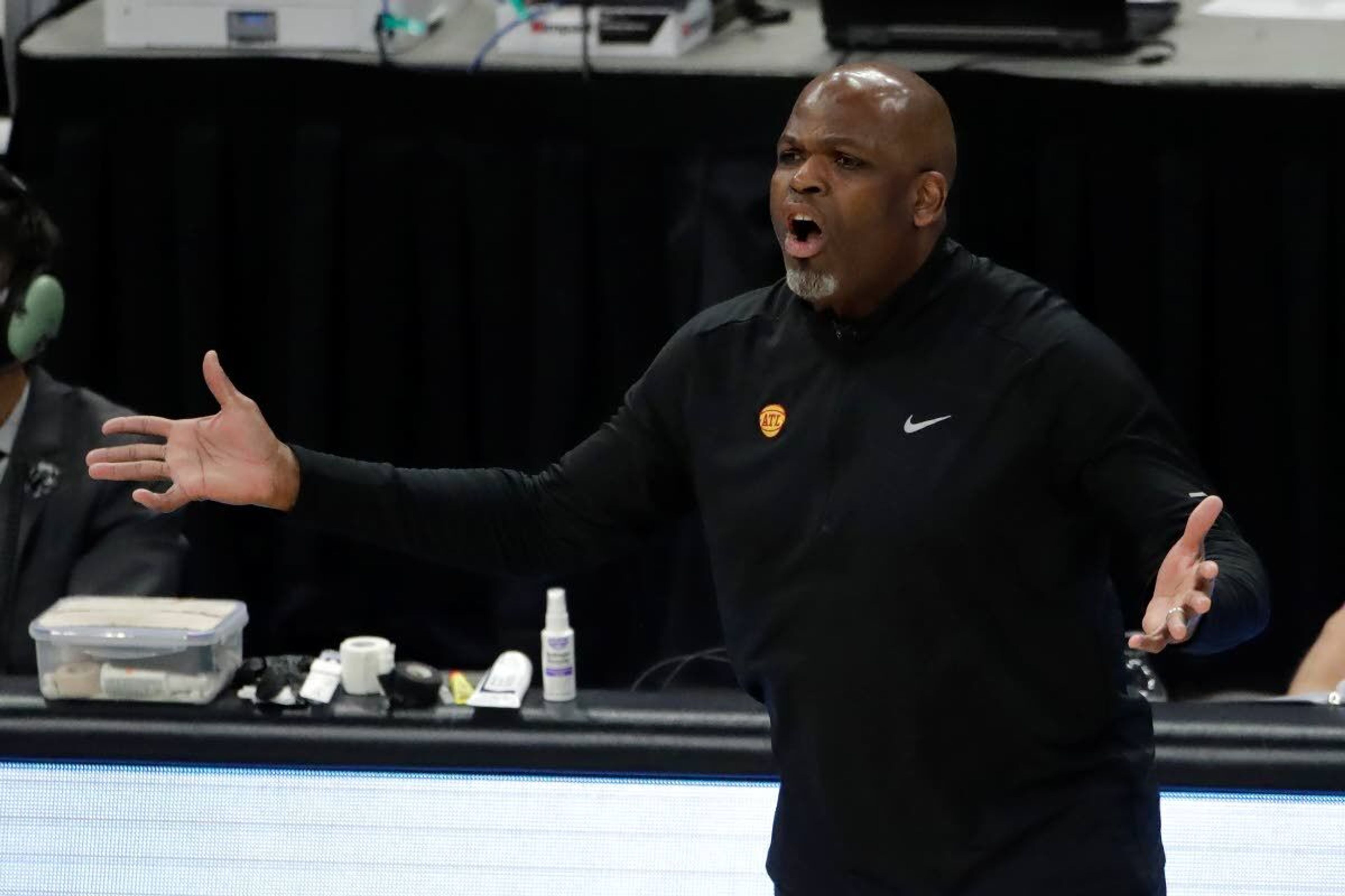 Atlanta Hawks' head coach Nate McMillan reacts to a call during the first half of Game 5 of the NBA Eastern Conference Finals against the Milwaukee Bucks Thursday, July 1, 2021, in Milwaukee. (AP Photo/Aaron Gash)