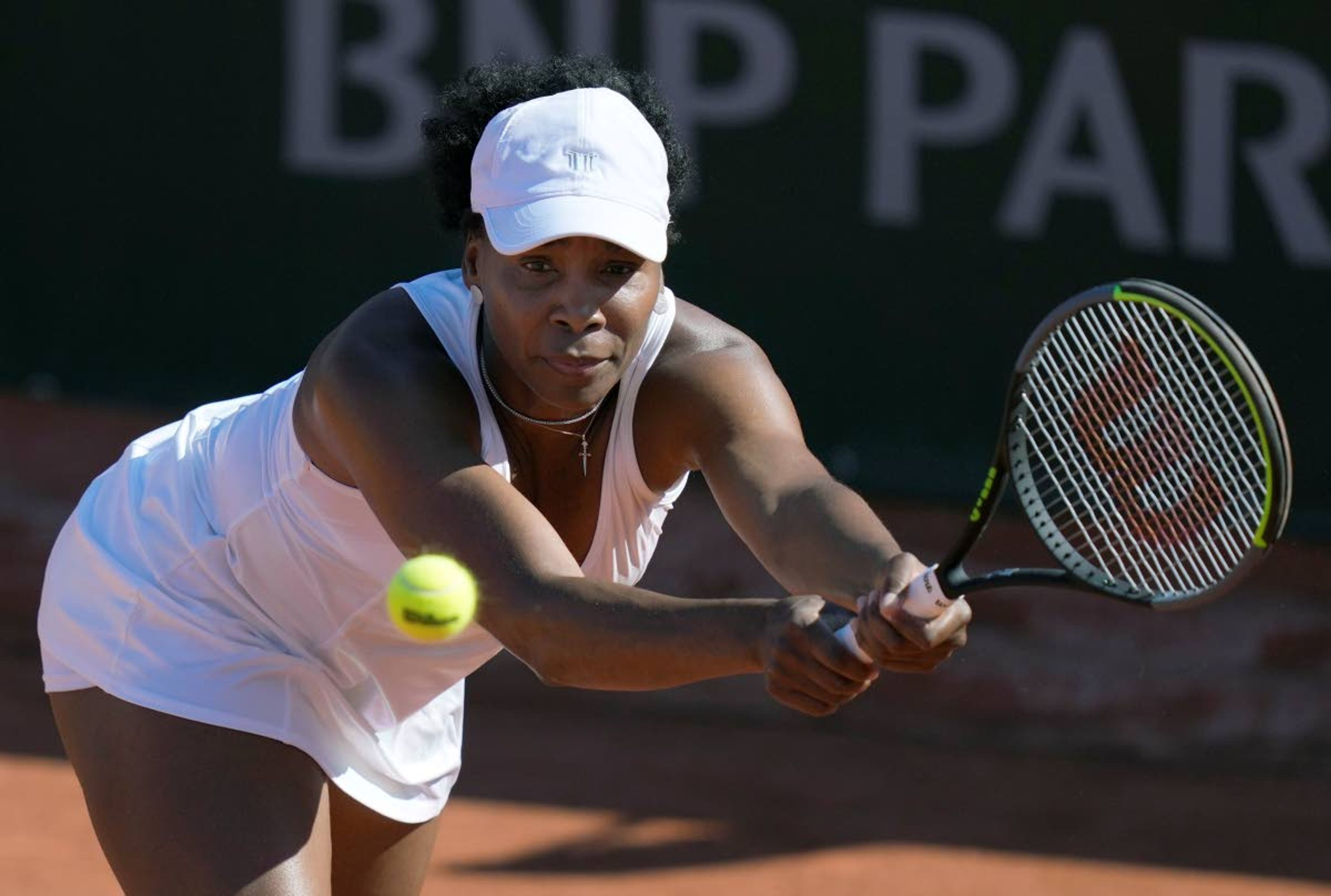 United States Venus Williams plays a return to Russia's Ekaterina Alexandrova during their first round match on day three of the French Open tennis tournament at Roland Garros in Paris, France, Tuesday, June 1, 2021. (AP Photo/Thibault Camus)