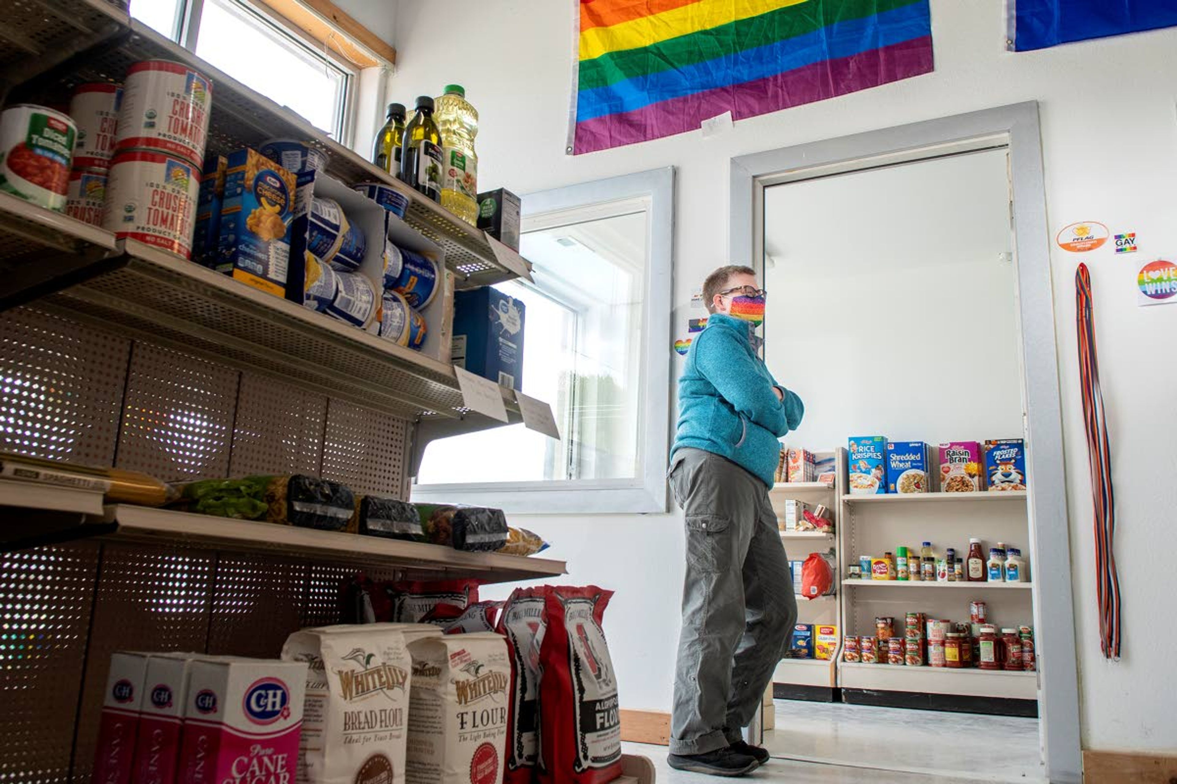 Kathy Sprague, president of Inland Oasis, which is a nonprofit organization that supports the LGBTQA community around the Palouse, poses for a picture inside the West Side Food Pantry on Tuesday afternoon. The West Side Food Pantry officially opened Sunday.