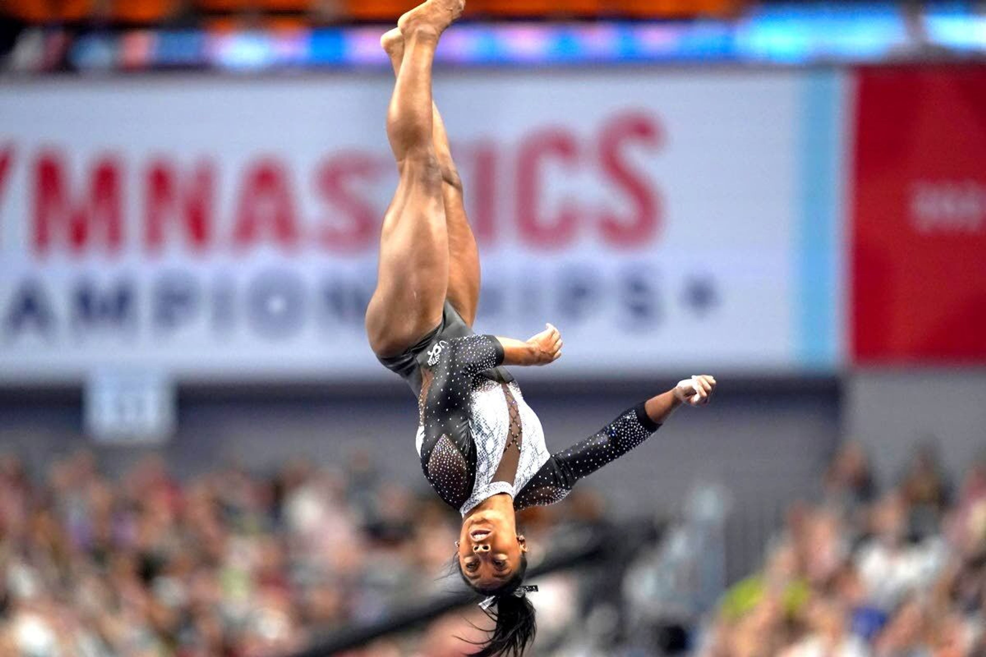 Simone Biles competes on the vault during the U.S. Gymnastics Championships, Sunday, June 6, 2021, in Fort Worth, Texas. (AP Photo/Tony Gutierrez)