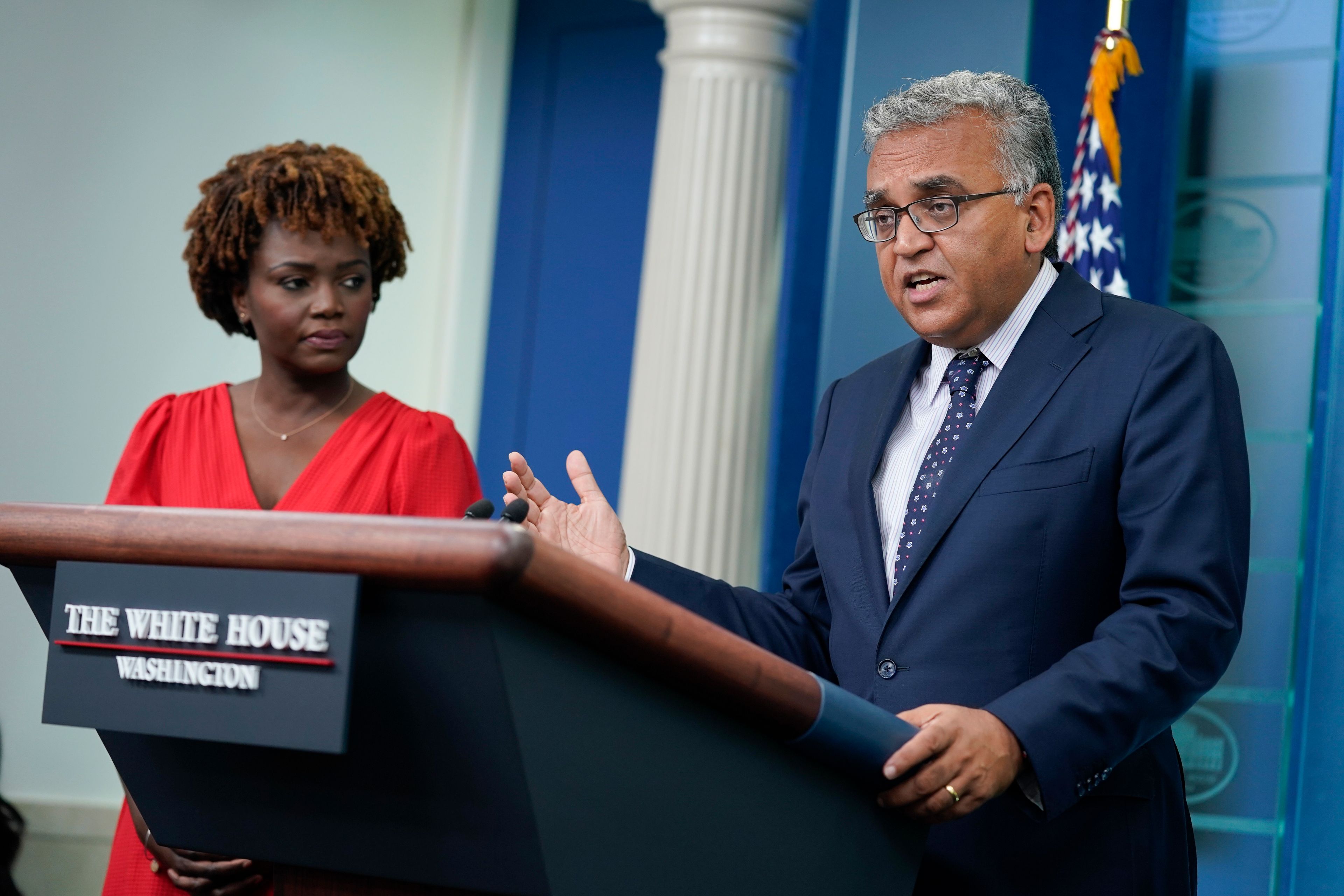 White House Covid Response Coordinator Ashish Jha speaks about President Joe Biden's positive COVID-19 test during a briefing at the White House, Thursday, July 21, 2022, in Washington. White House press secretary Karine Jean-Pierre listens at left. (AP Photo/Evan Vucci)