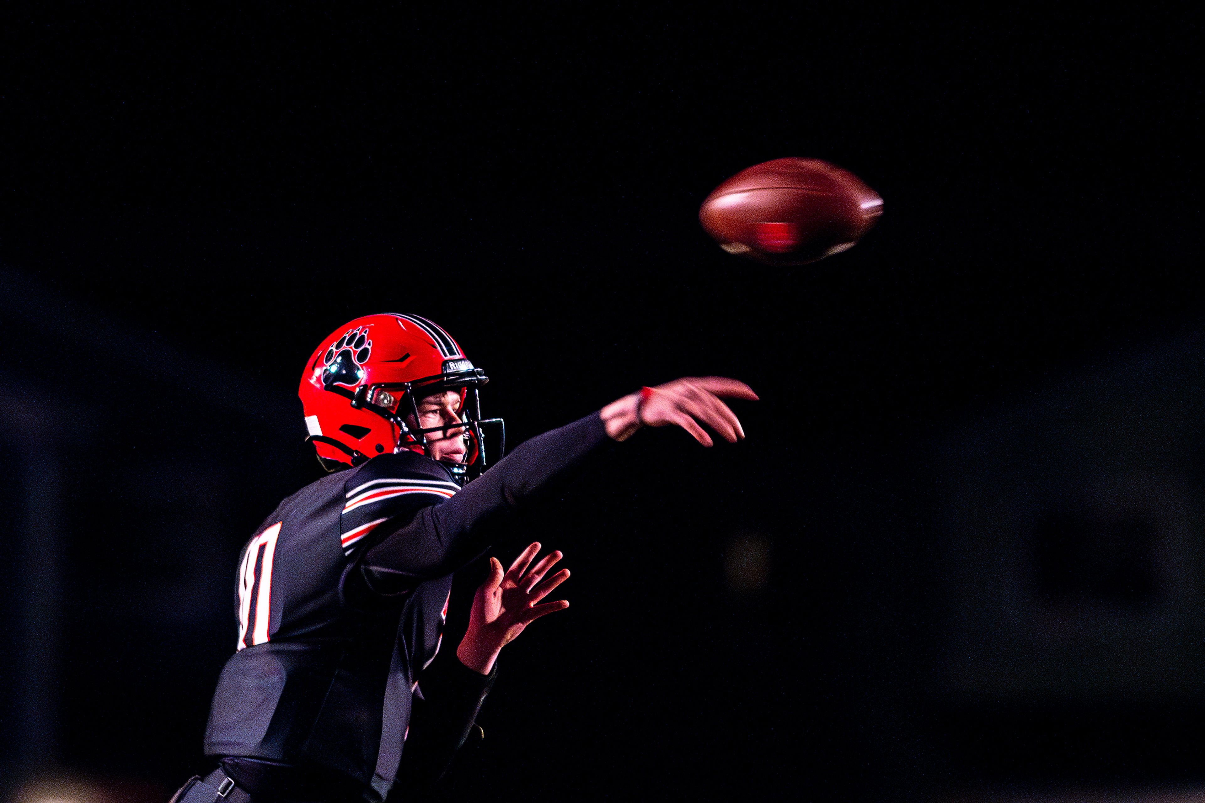 Moscow quarterback Noah Velasco throws a pass against American Falls during an Idaho 4A playoff game Friday in Moscow.