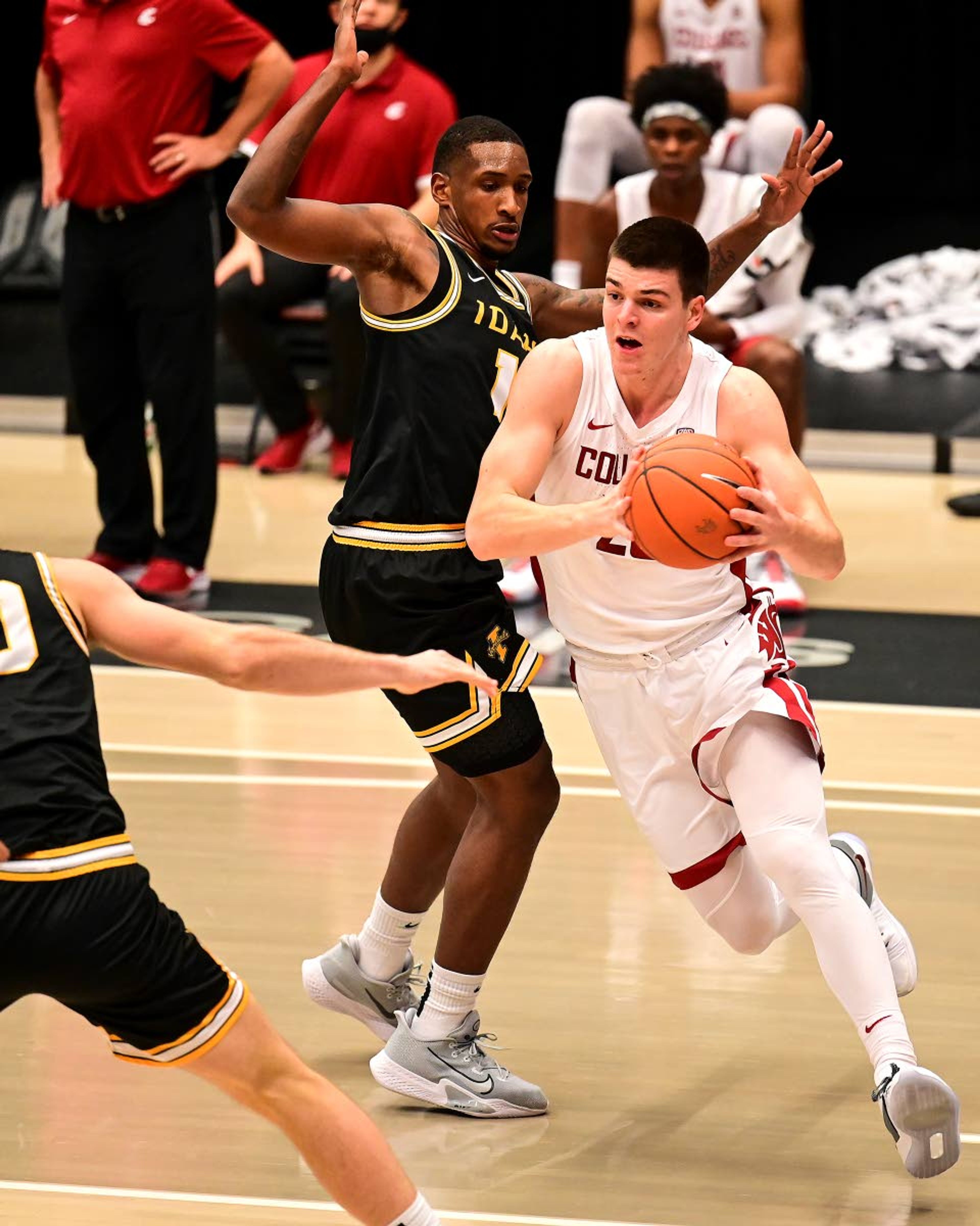 Cougar forward Andrej Jakimovski, with ball, drives to the basket Dec. 9 against Idaho at Beasley Coliseum.