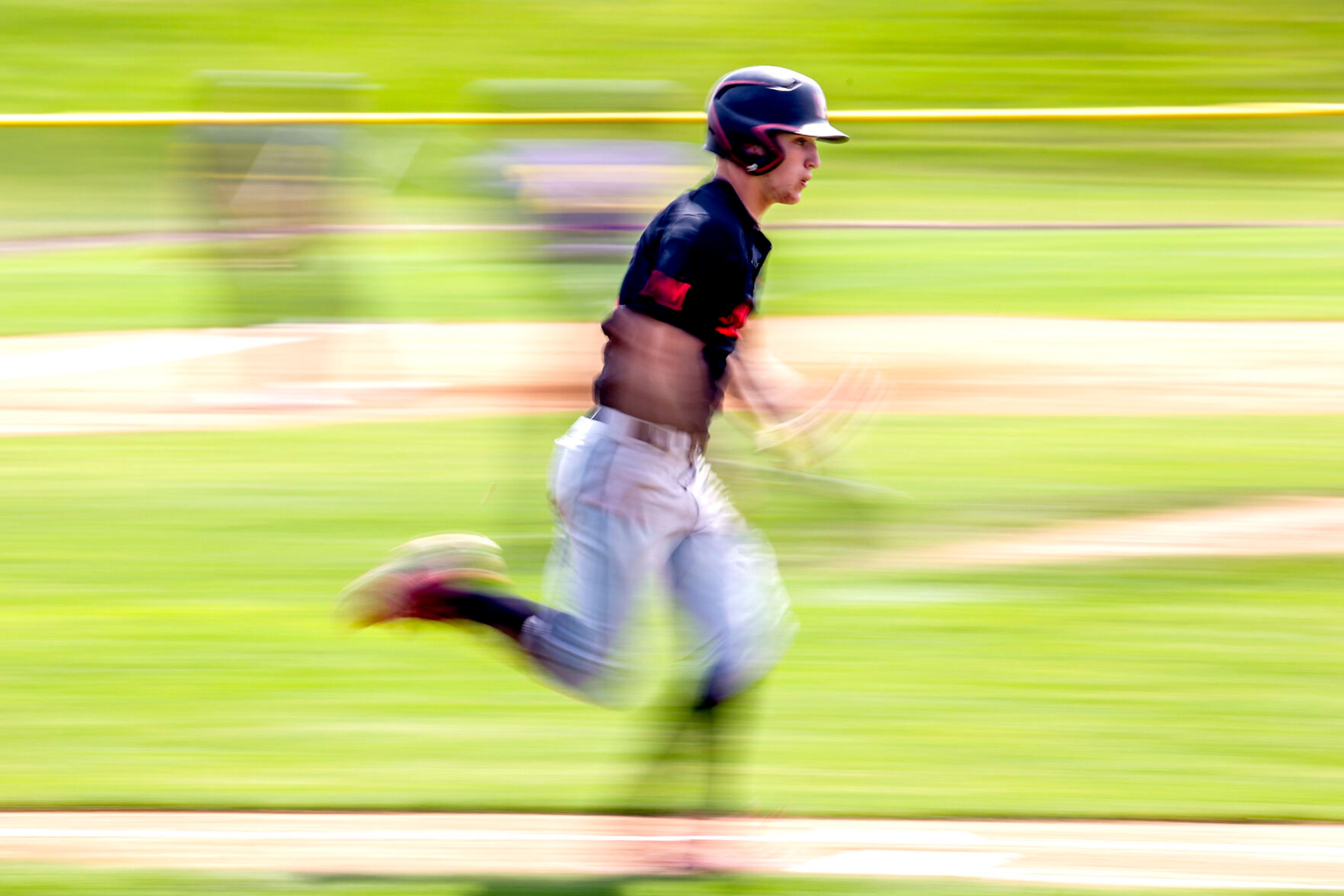 Moscow’s Chad Redinger runs for first base against Lewiston at Church Field on Saturday. Lewiston defeated Moscow 6-4.