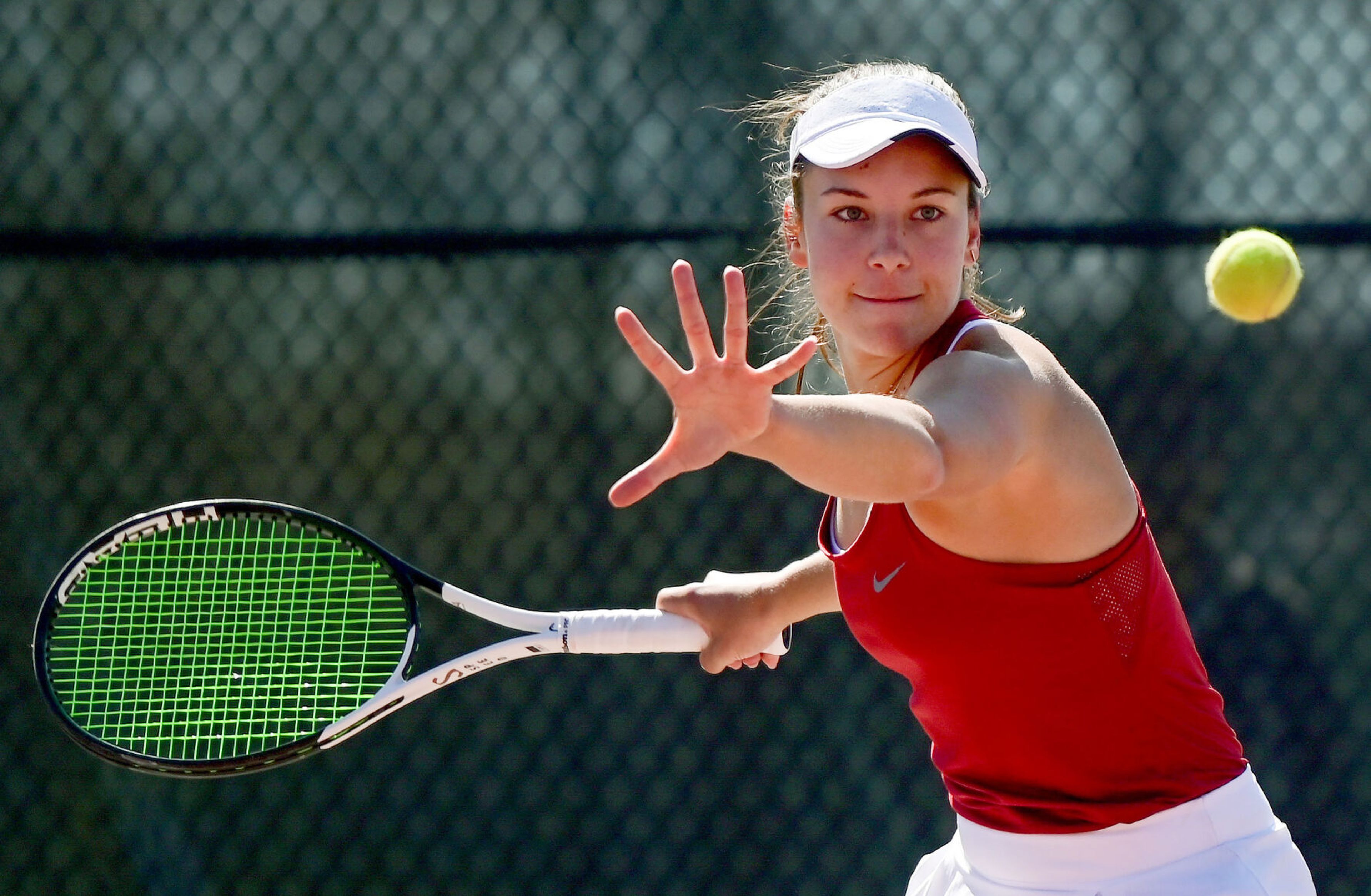 Washington State’s Eva Alvarez Sande prepares for a shot in a doubles match with fellow Cougar Elyse Tse against Washington in Pullman on Friday.