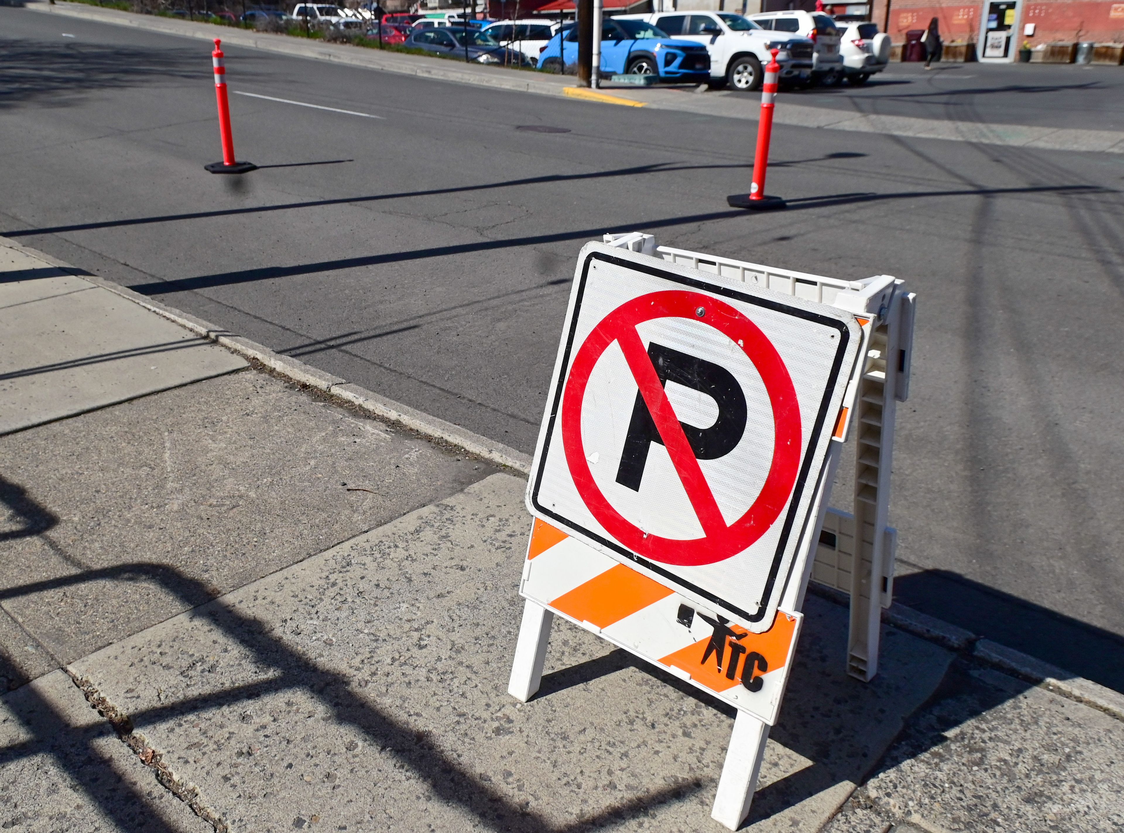 Signs mark where parking is no longer available along streets near downtown in Pullman on Monday before the start of construction on Main Street.