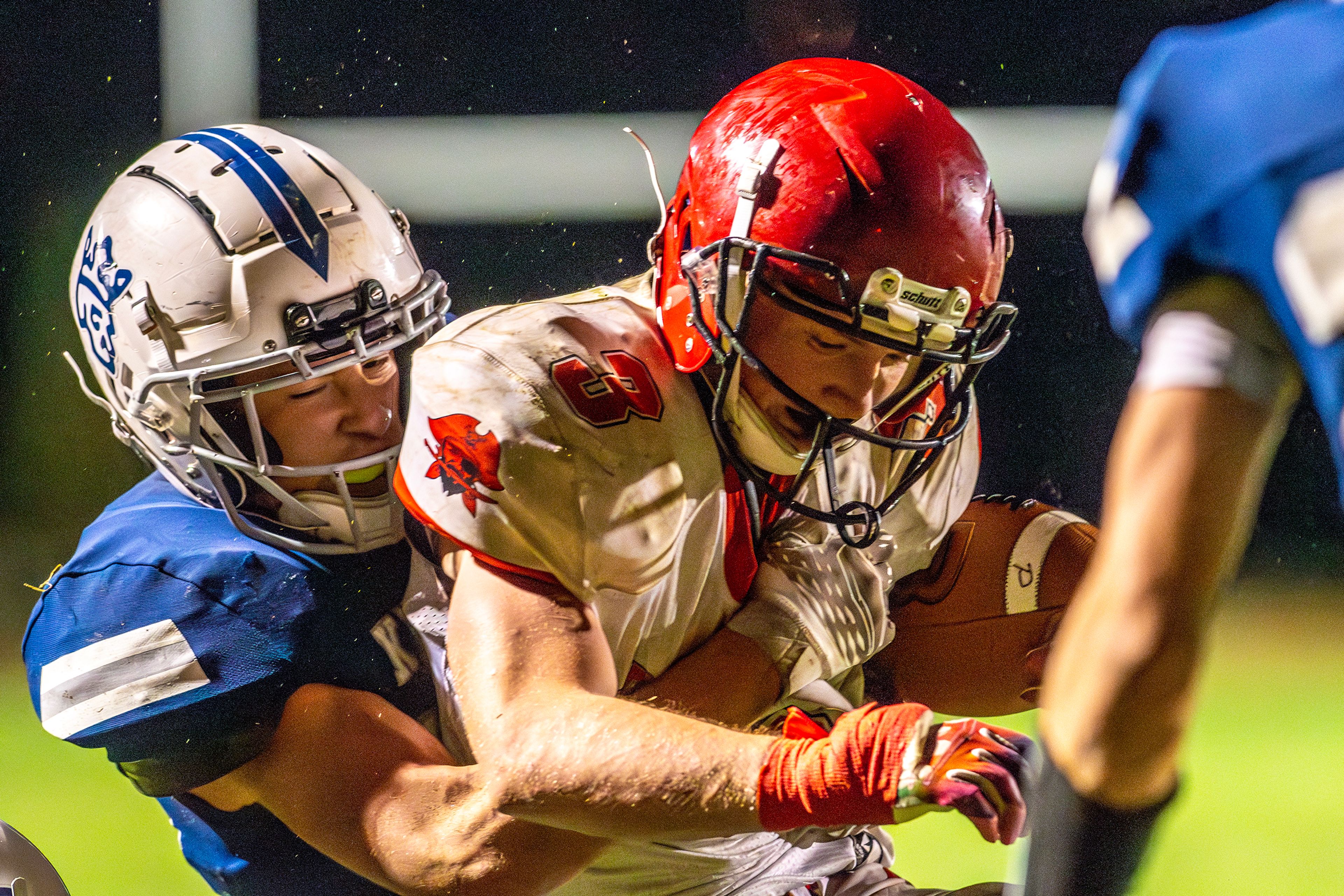 Prairie Dylan Uhlenkott is tackled by a Logos player during a conference game Friday in Moscow.,