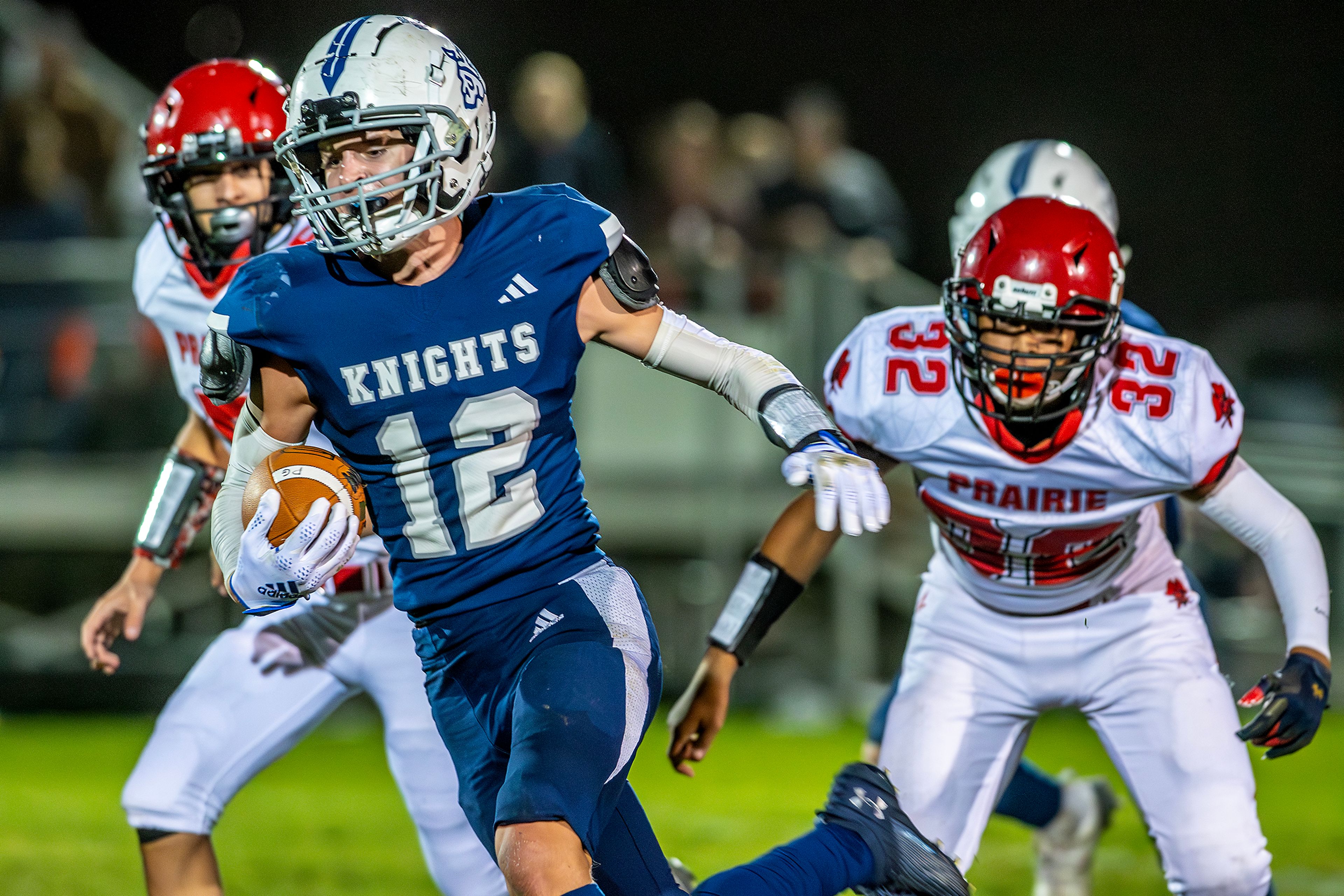 Logos Ryan Daniels runs the ball against Prairie during a conference game Friday in Moscow.,