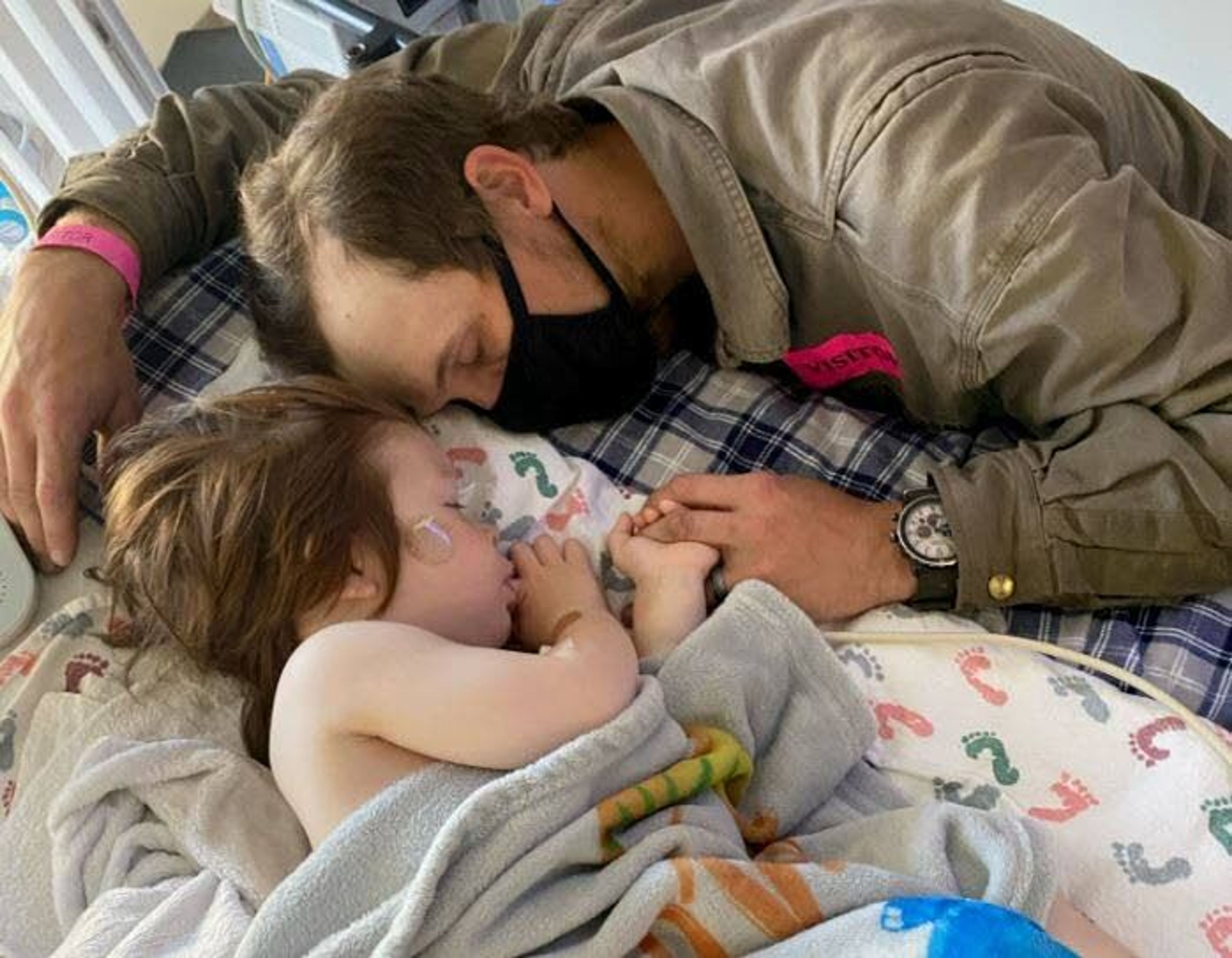 Waylon Reid, 2, is comforted by his father, Zachary, at Sacred Heart Medical Center in Spokane. Waylon nearly drowned Friday in his grandparents’ pond near Troy. He was transported to Spokane after the incident and was released from the hospital Monday in what caregivers consider a “Mother’s Day miracle.”Courtesy of the Reid family