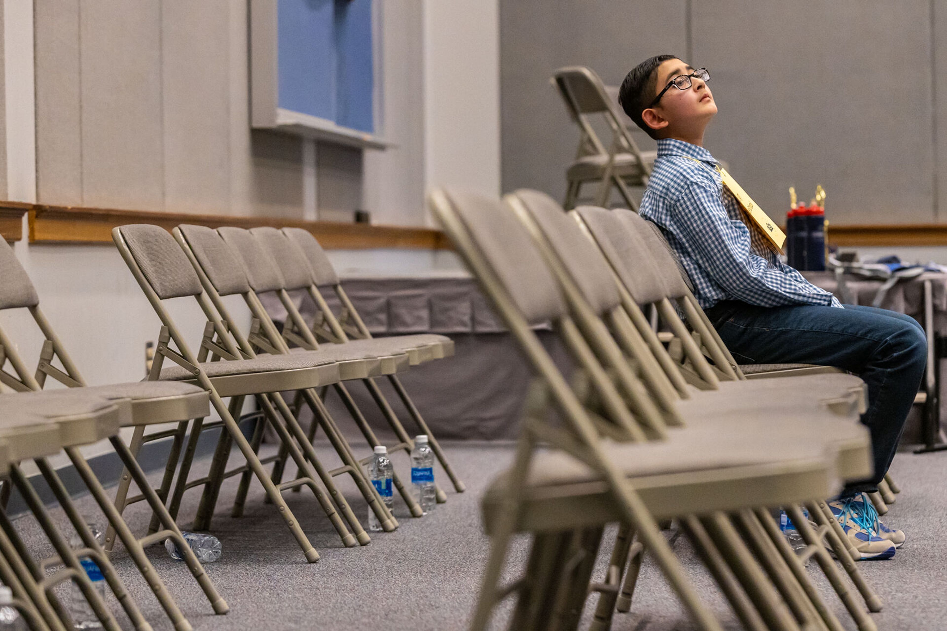 Navtaj Singh, of Lincoln Middle School, waits for his turn as one of two final competitors Saturday during the Inland Northwest Regional Spelling Bee at Lewis-Clark State College in Lewiston.