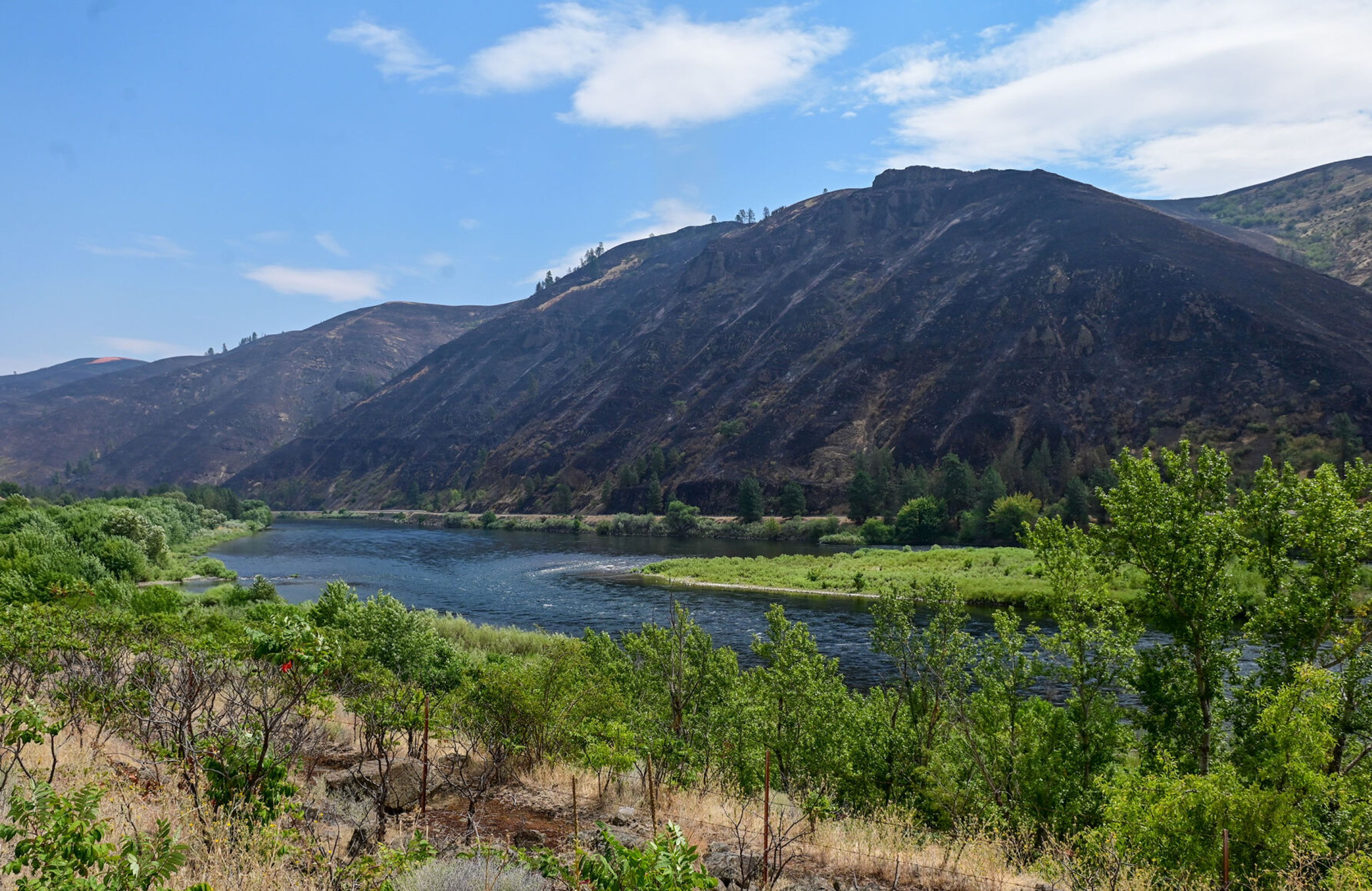 Damage from the Gwen Fire is visible along U.S. Highway 12 from a viewpoint along Idaho Highway 3 on Monday.