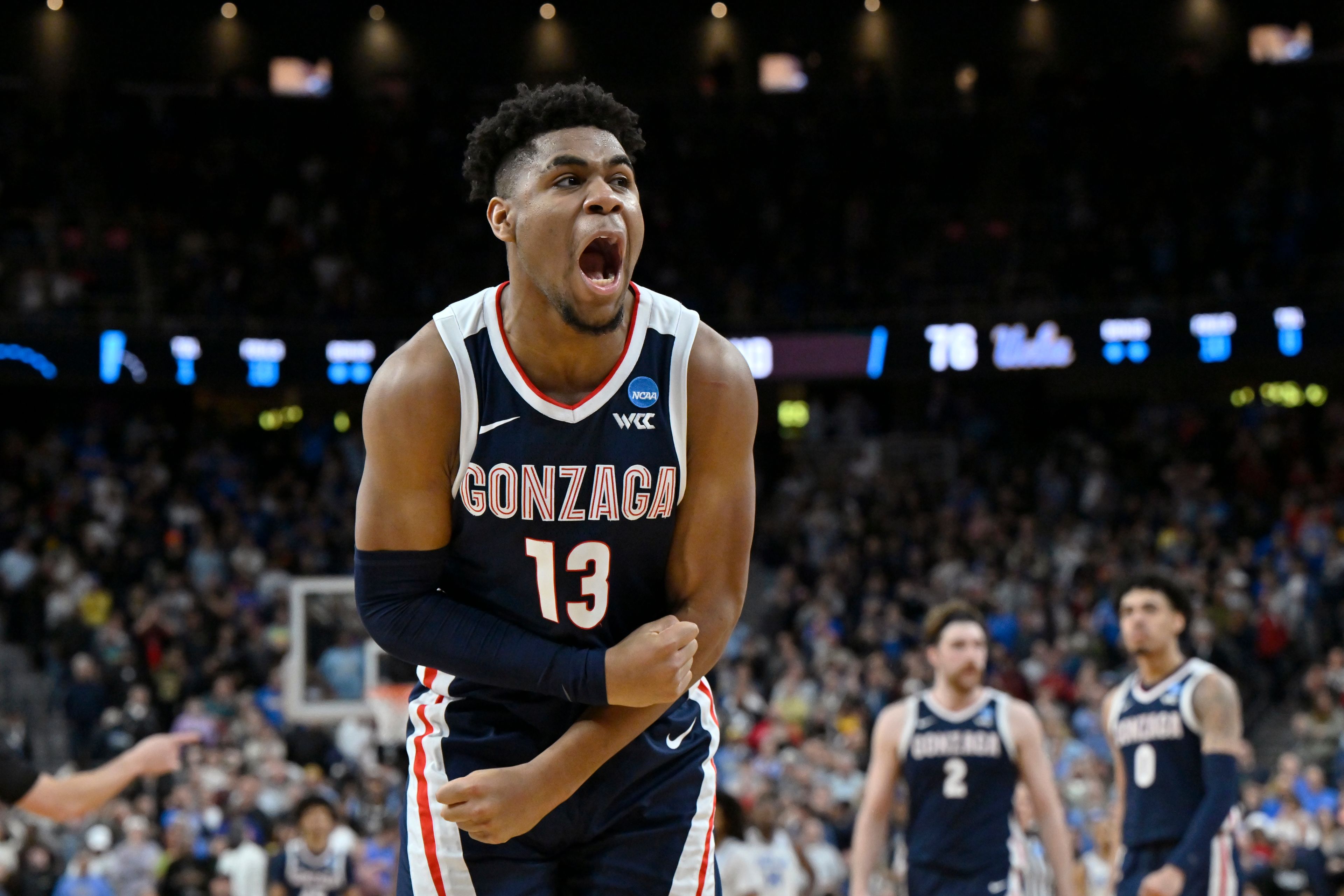 Gonzaga's Malachi Smith (13) celebrates in the second half of a Sweet 16 college basketball game against UCLA in the West Regional of the NCAA Tournament, Thursday, March 23, 2023, in Las Vegas. (AP Photo/David Becker)