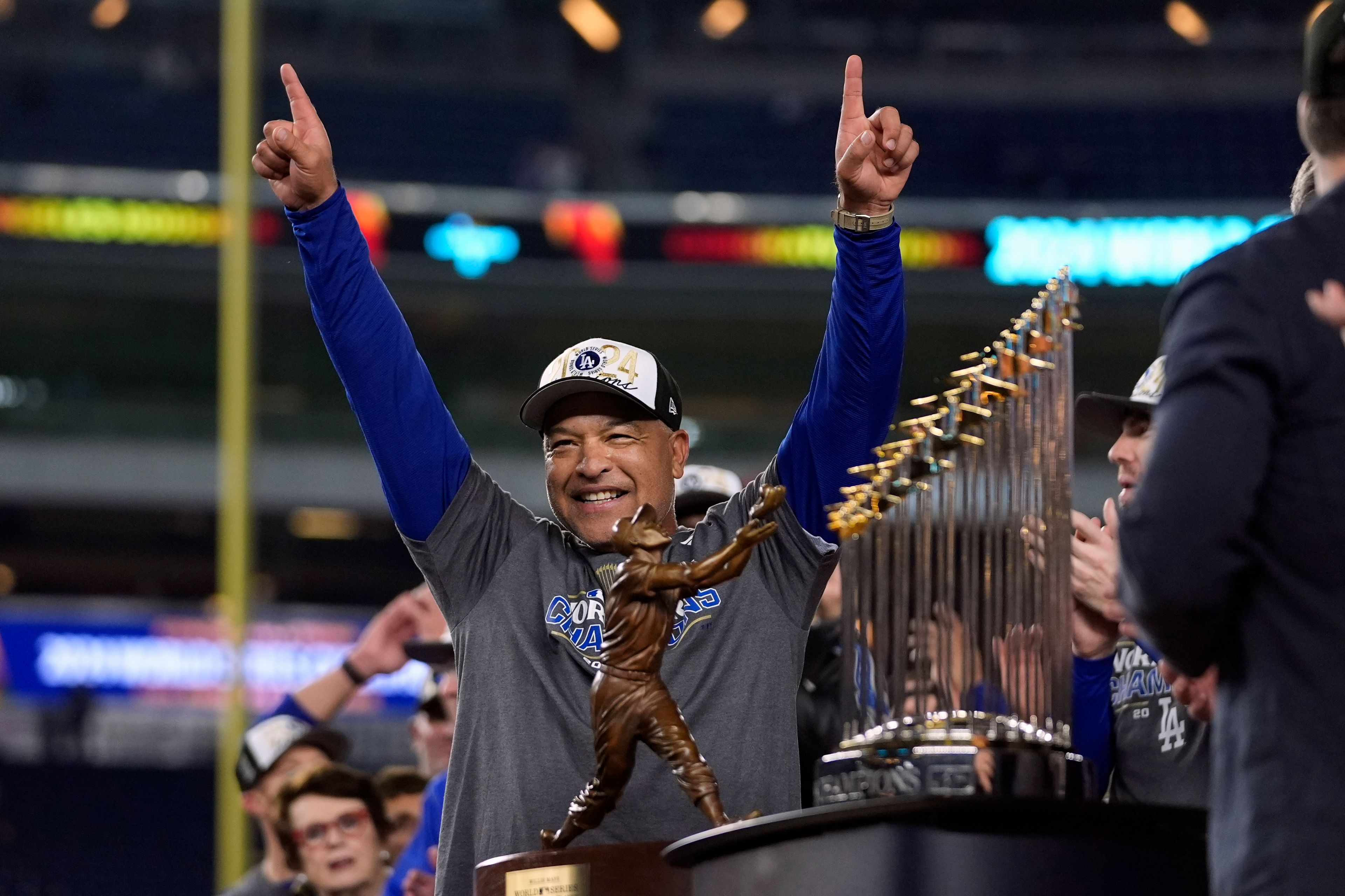 Los Angeles Dodgers manager Dave Roberts celebrates after the Dodgers beat New York Yankees in Game 5 to win the baseball World Series, Thursday, Oct. 31, 2024, in New York. (AP Photo/Godofredo A. VÃ¡squez)