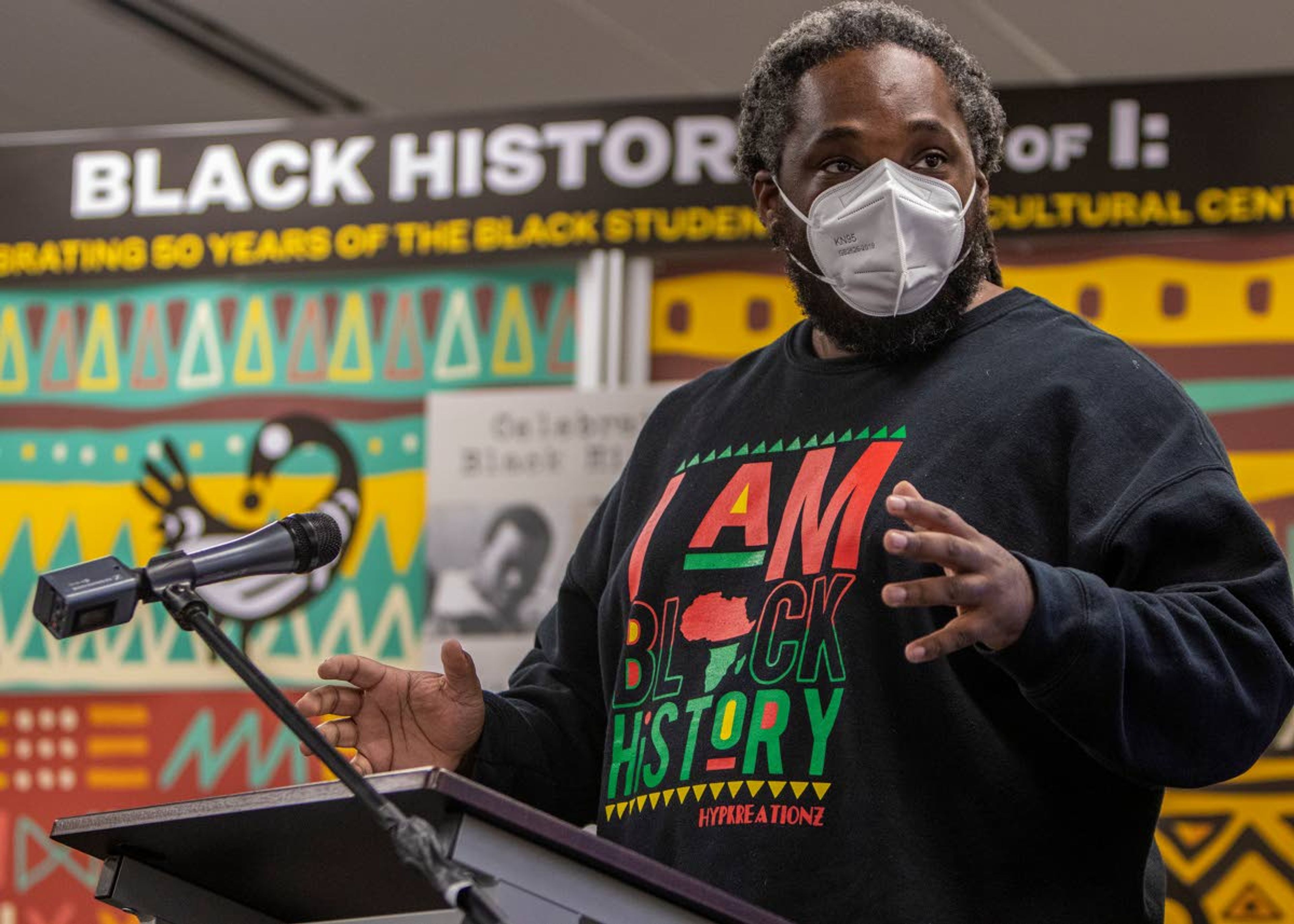 University of Idaho professor Sydney Freeman Jr. addresses a crowd Tuesday during the opening reception of the exhibit on Black History at UI on the first floor of the UI library in Moscow.