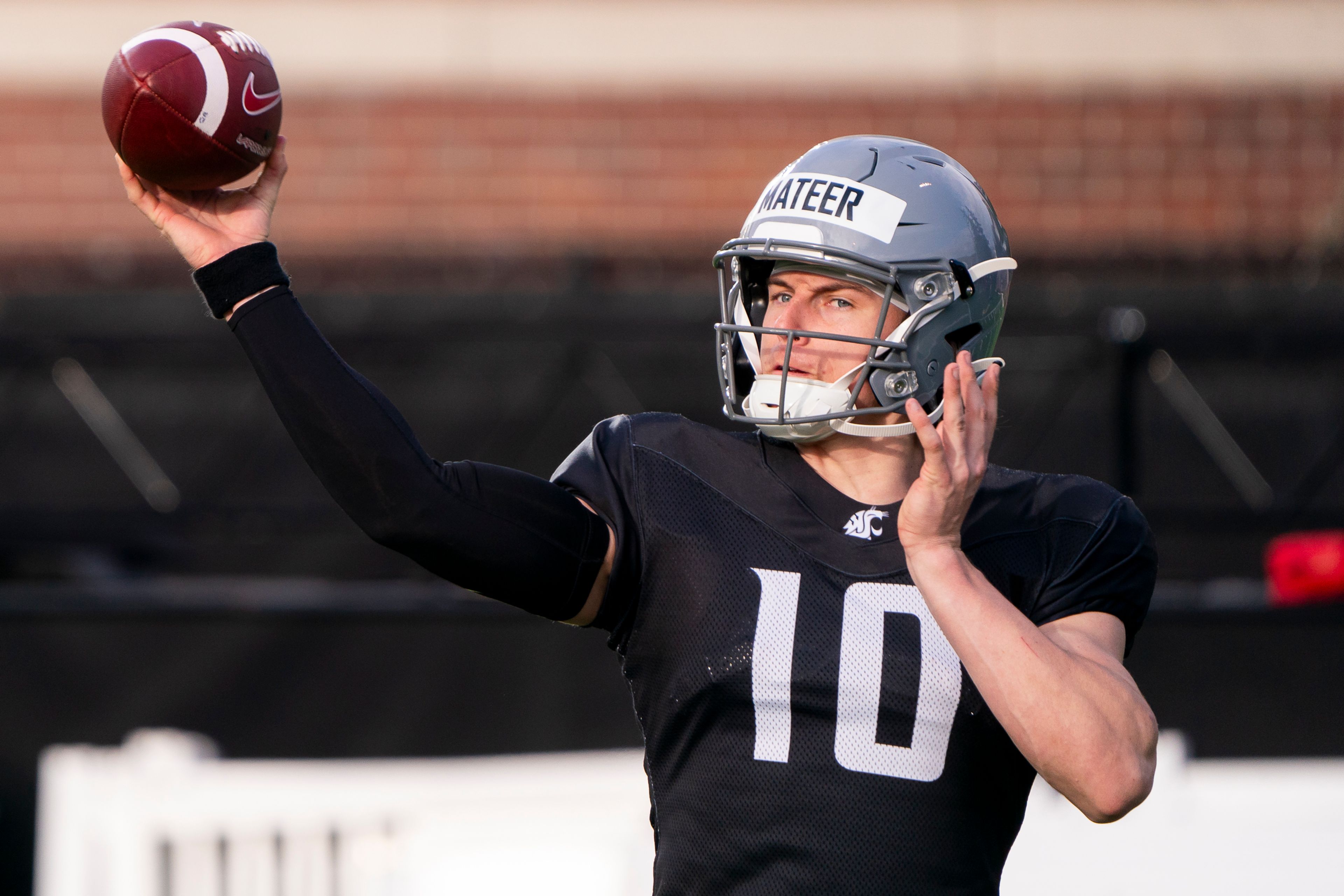 Washington State’s John Mateer throws the ball during a practice April 9 at the Cougar Football Complex in Pullman.