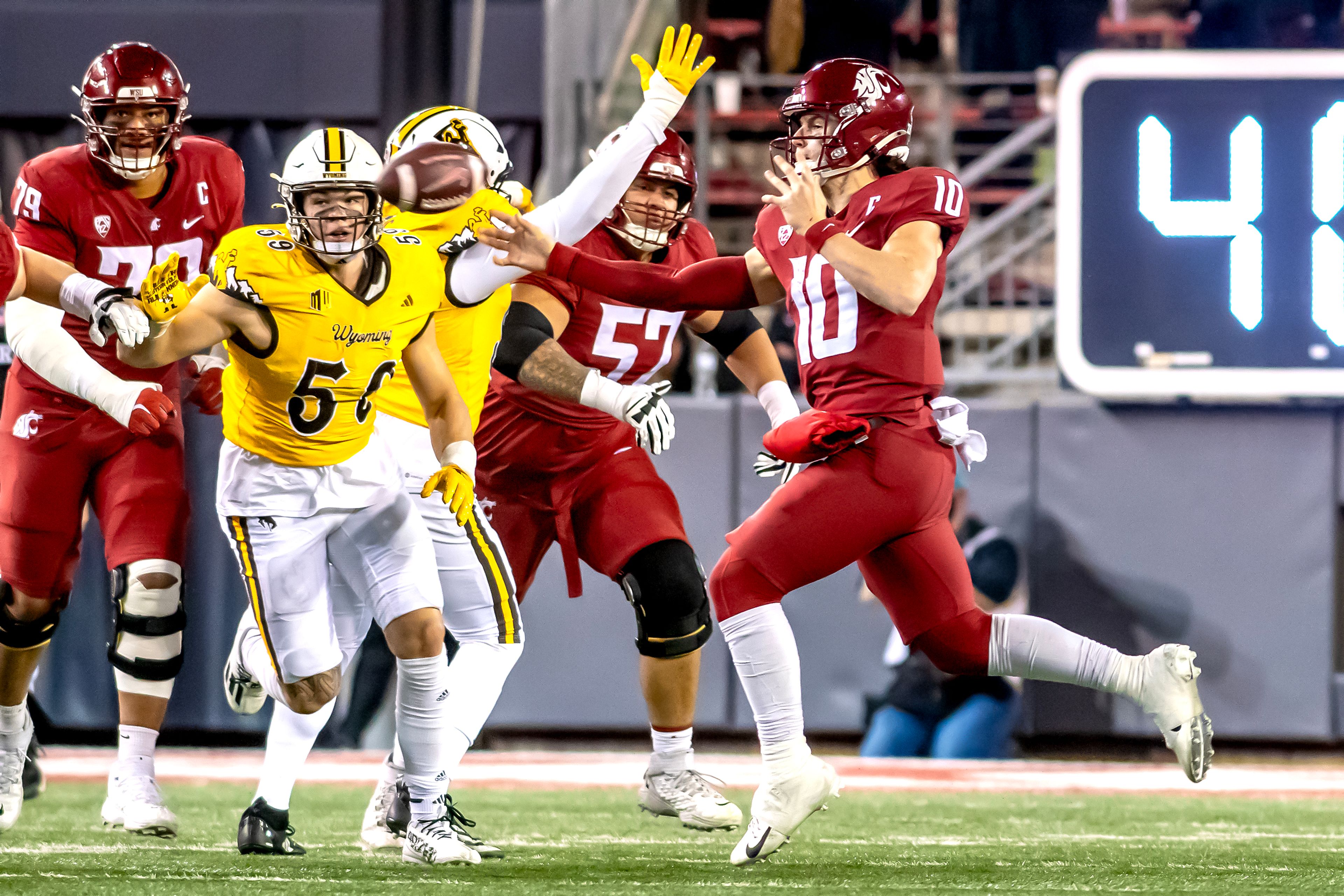 Washington State quarterback John Mateer throws a pass against Wyoming during a quarter of a college football game on Saturday, at Gesa Field in Pullman. Wyoming defeated Washington State 15-14.