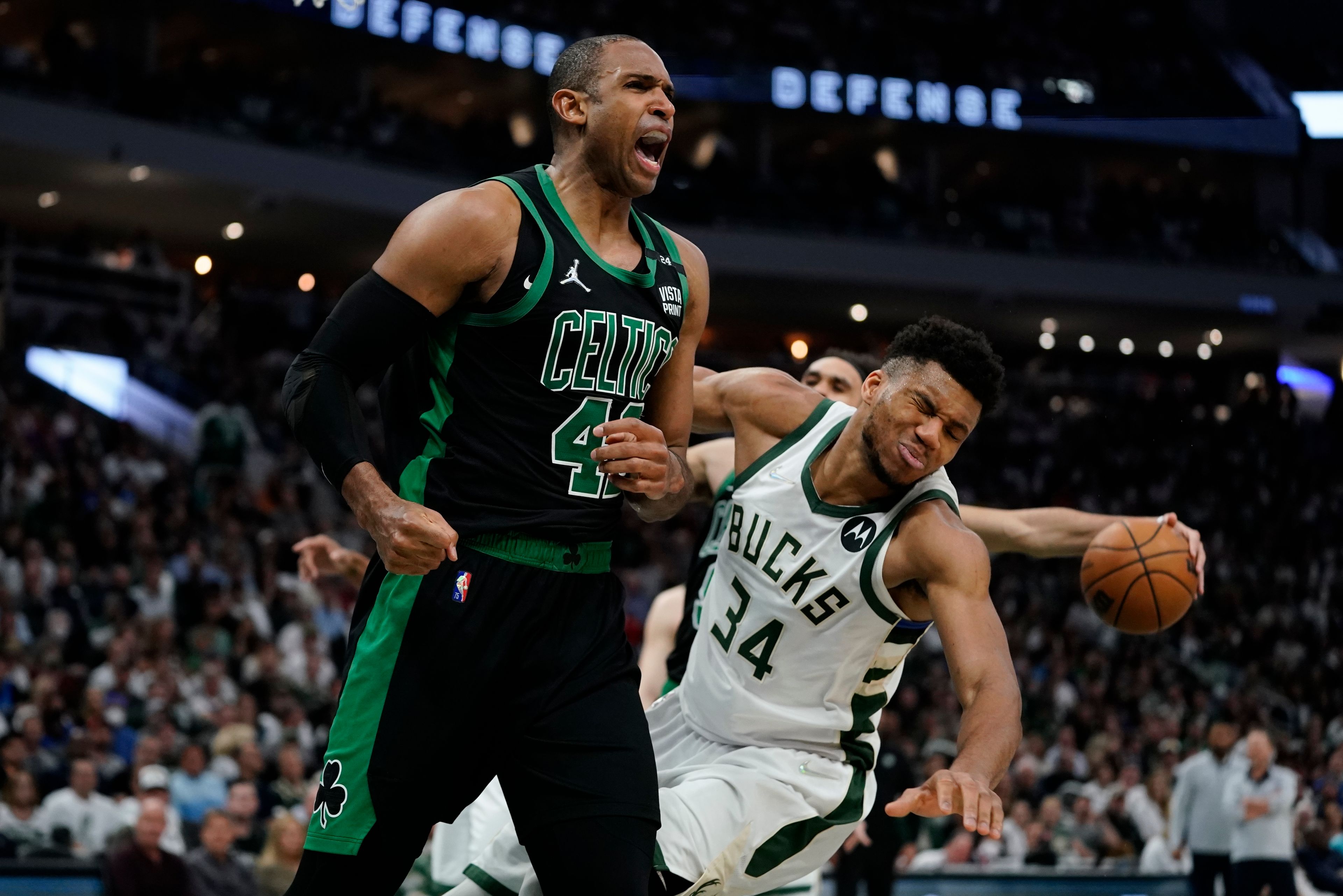 Associated Press The Celtics’ Al Horford reacts in front of the Bucks’ Giannis Antetokounmpo during the second half of Monday’s Game 4 of their Eastern Conference semifinals playoff series in Milwaukee. Horford scored 30 point as the Celtics won 116-108 and tied the series 2-2.