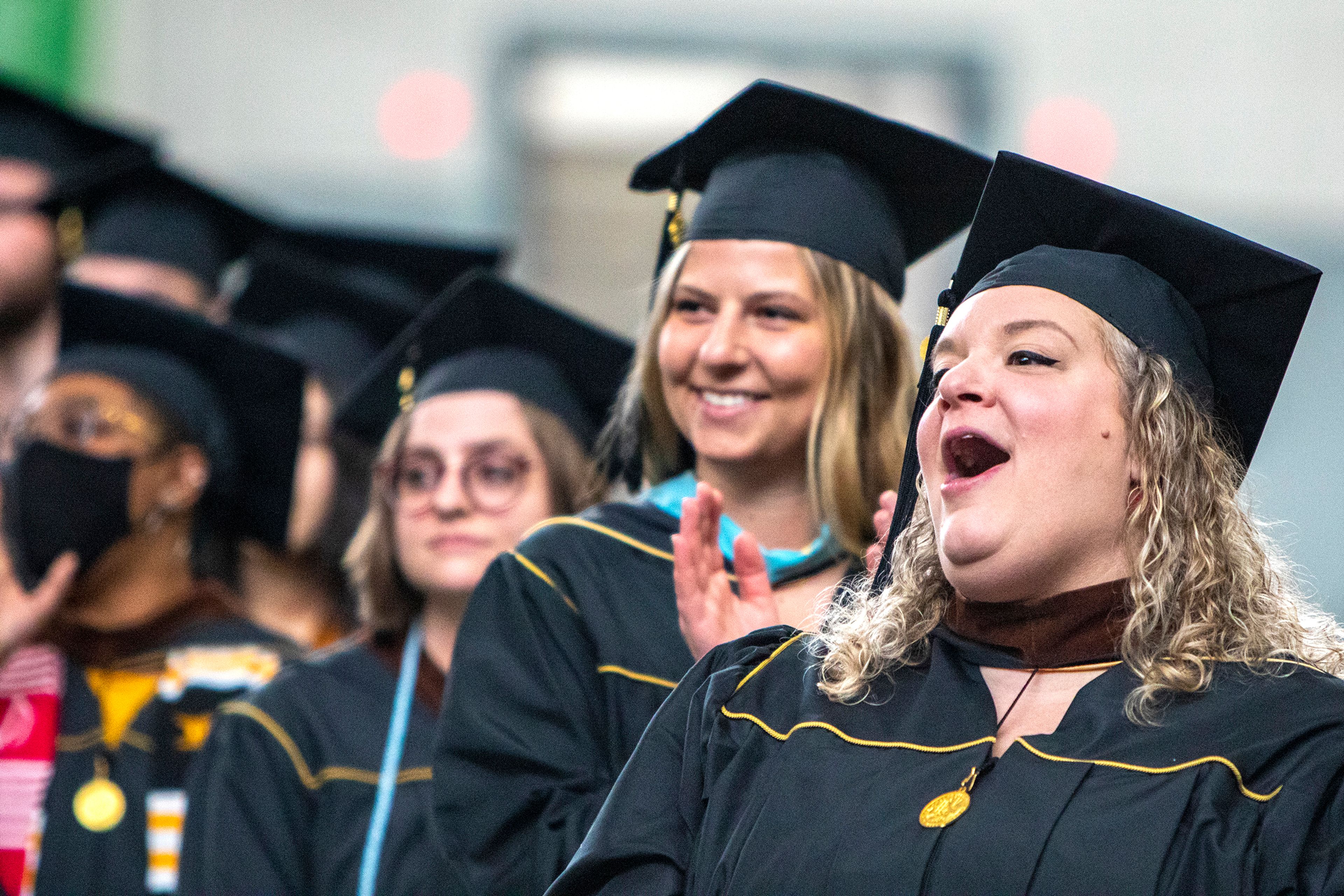 Austin Johnson/Daily News A graduate cheers as their friend walks across the stage Saturday morning during the University of Idaho’s 2022 Spring Commencement Ceremony at the Kibbie Dome in Moscow.