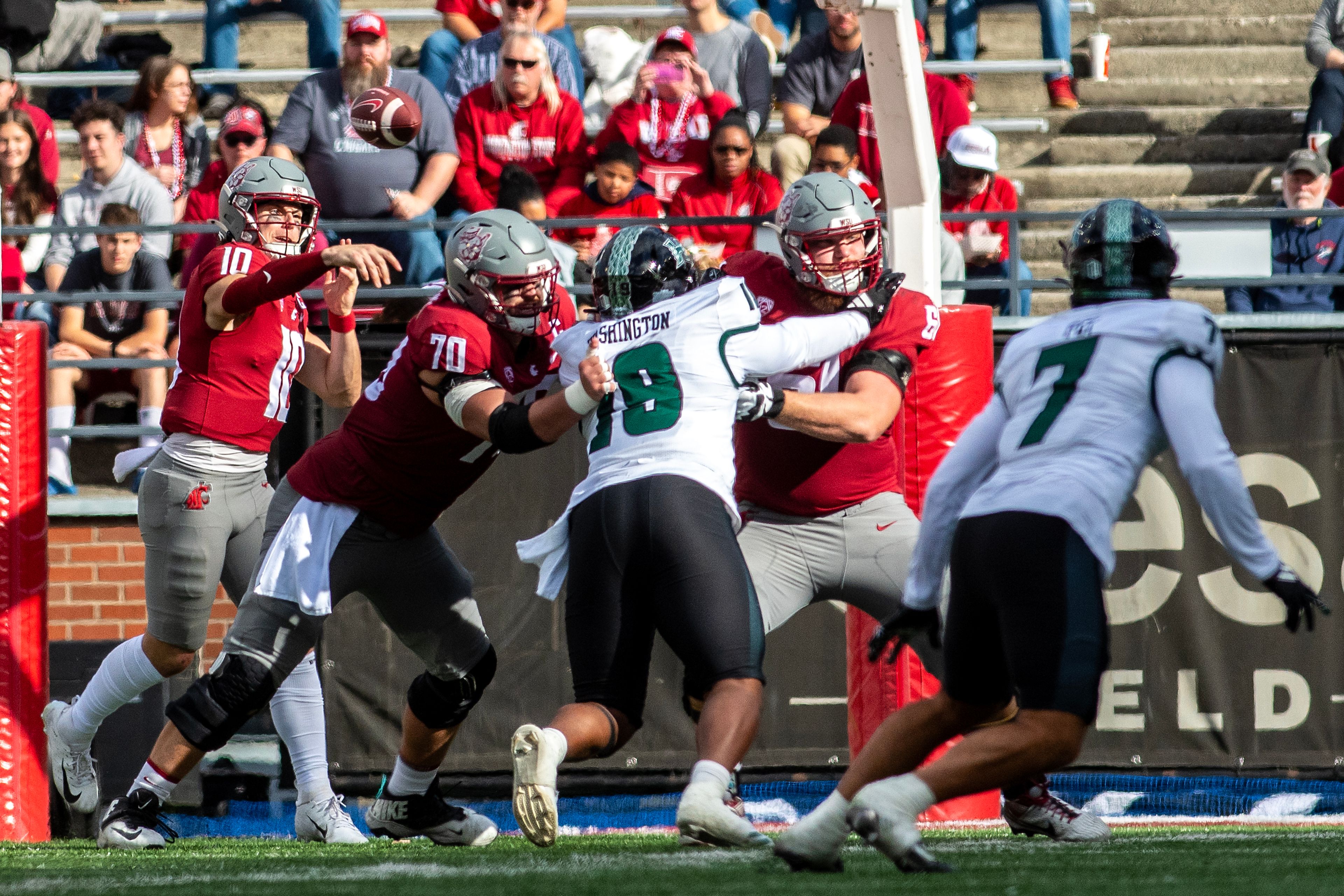 Washington State quarterback John Mateer  throws a pass against Hawaii in a college football game on Saturday at Gesa Field in Pullman.,