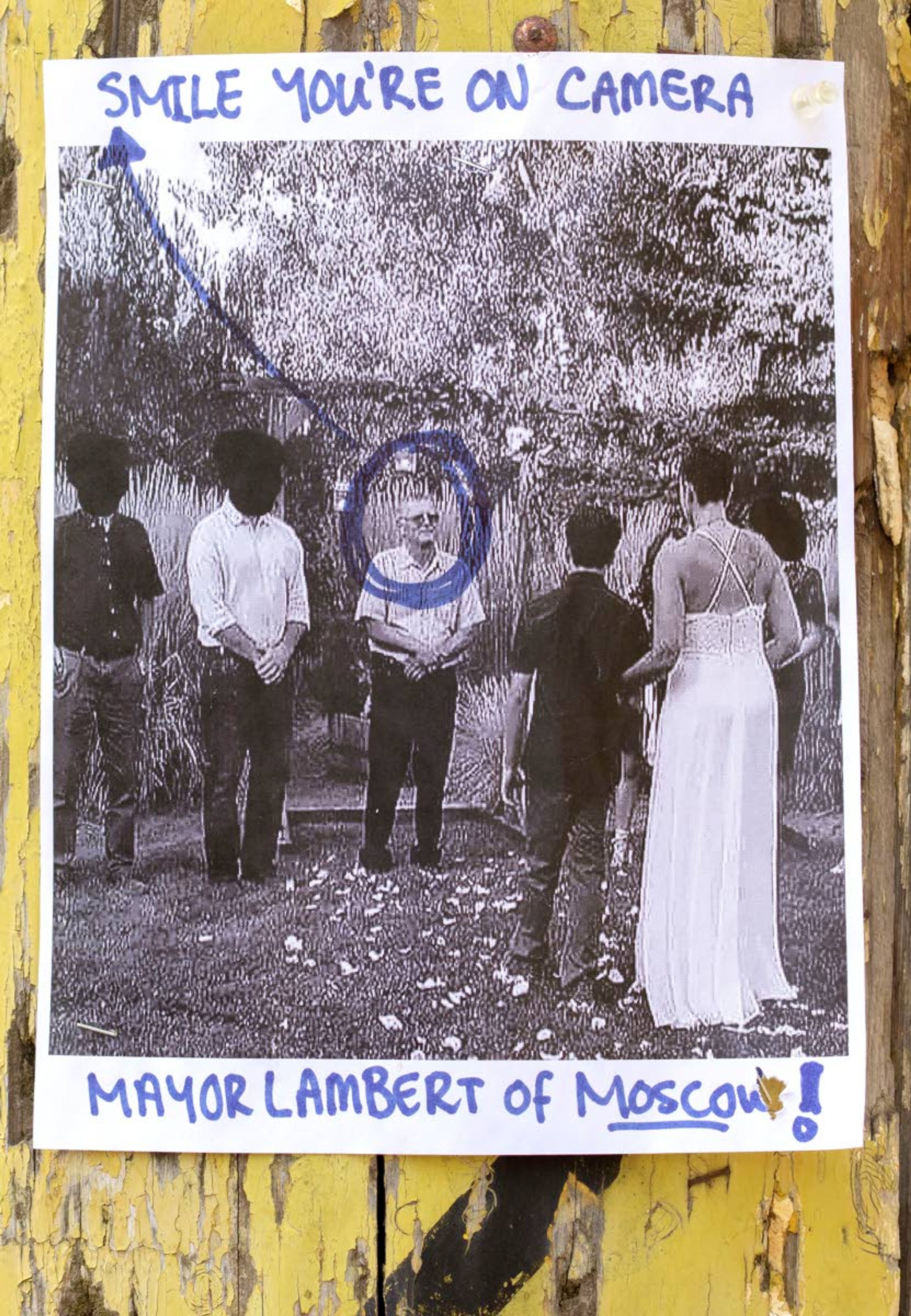 A photo of Moscow Mayor Lambert is posted on a utility pole on Thursday on Jefferson Street in Moscow. Lambert is seen without a mask at a recent private wedding.