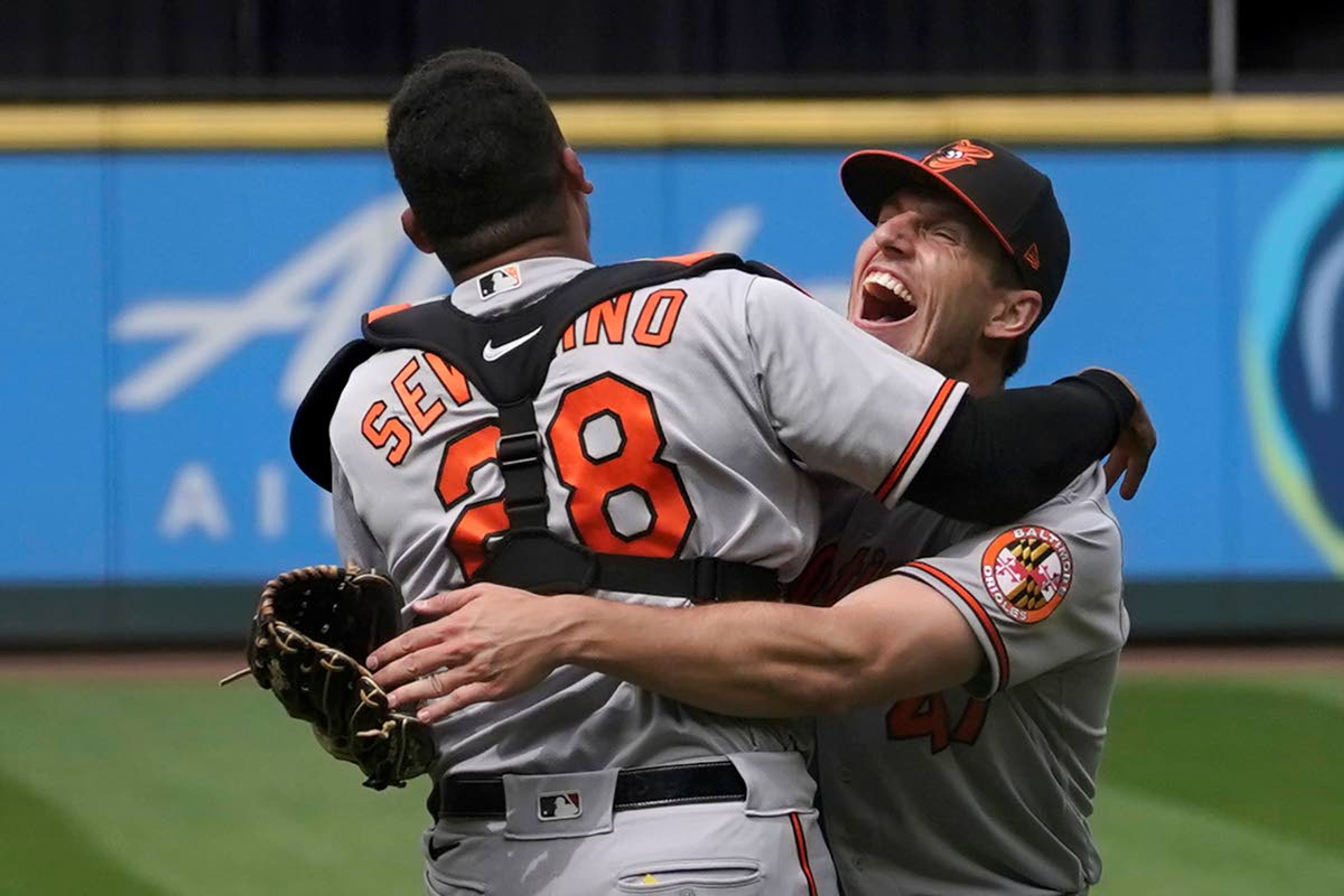 Baltimore starter John Means, right, hugs catcher Pedro Severino after Means threw a no-hitter against the Mariners on Wednesday in Seattle.