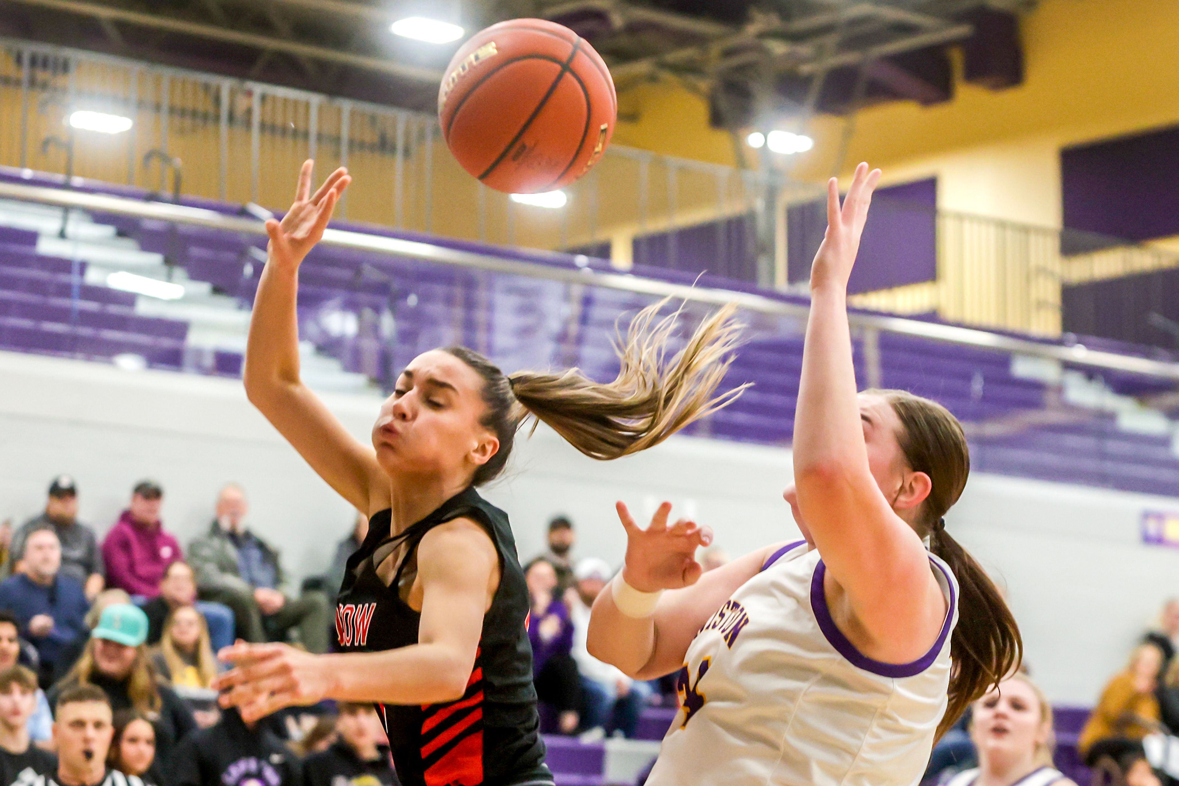 Moscow Forward Maya Anderson has her shot blocked by Lewiston point guard Savanah Burke in Lewiston on Wednesday.