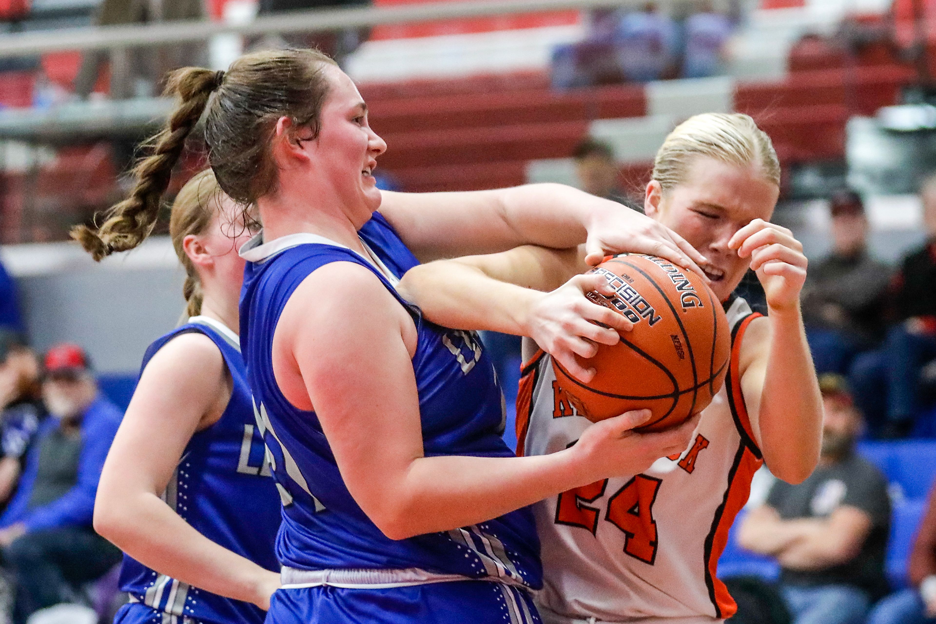 Kendrick guard Ruby Stewart fights for the ball with Leadore's Lexi Bird during a quarterfinal game in the girls 1A DII state tournament Thursday at Nampa High School in Nampa.