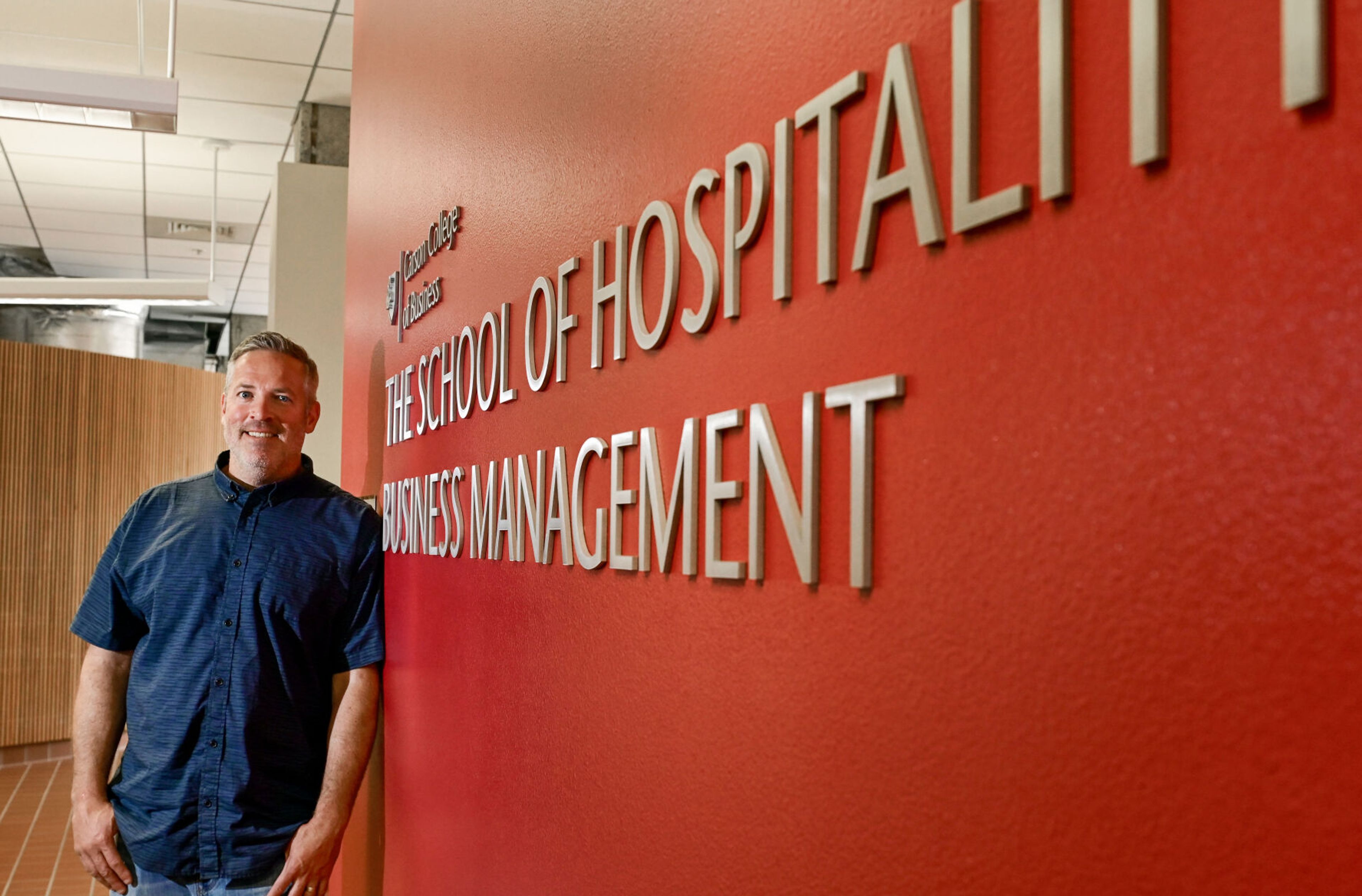 Jim Harbour, the recently appointed director for the School of Hospitality Business Management, stands in the school’s wing of Todd Hall on Washington State University campus on Monday.